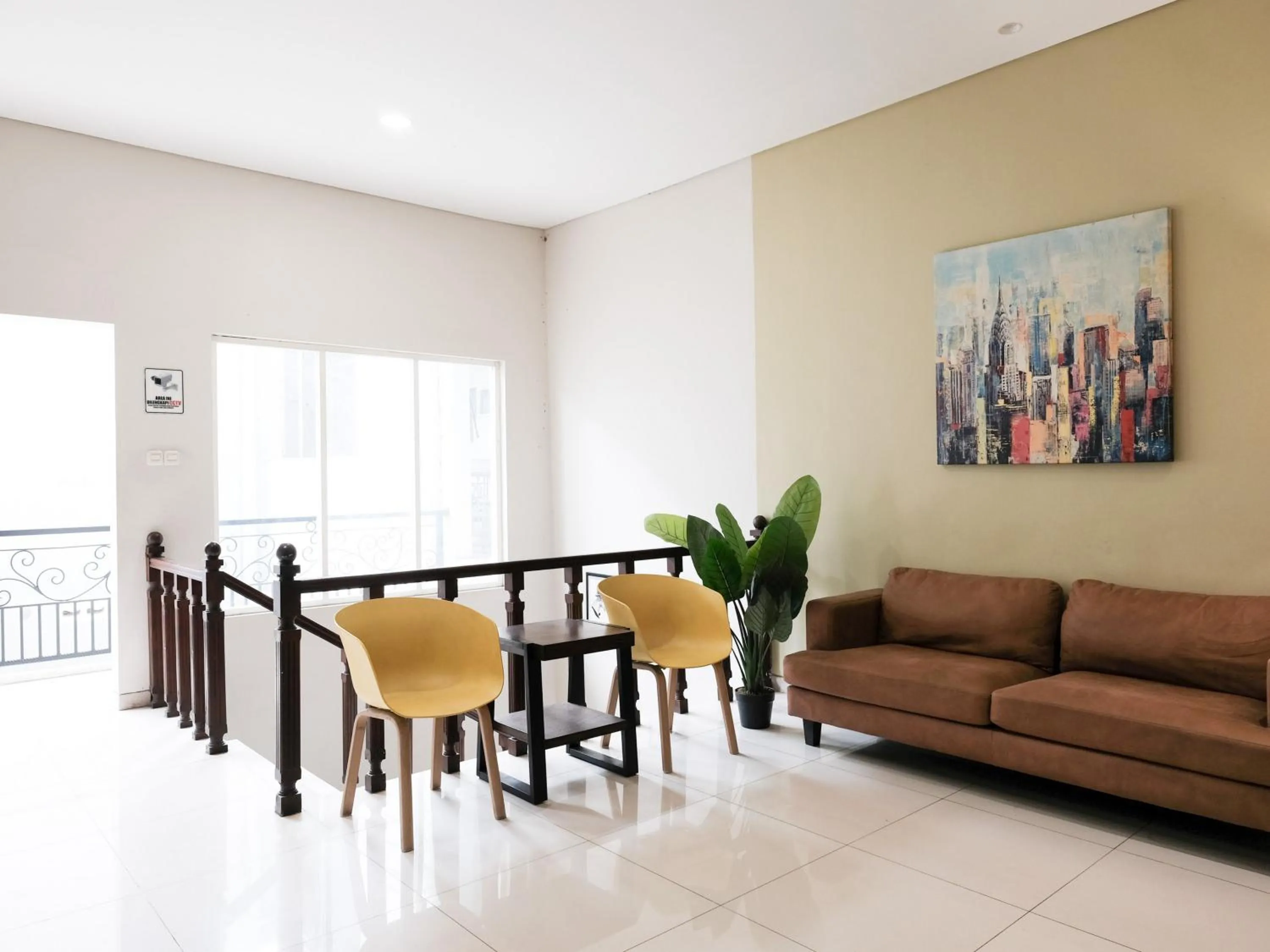 Seating area in RedDoorz near Ciputra Golf Surabaya