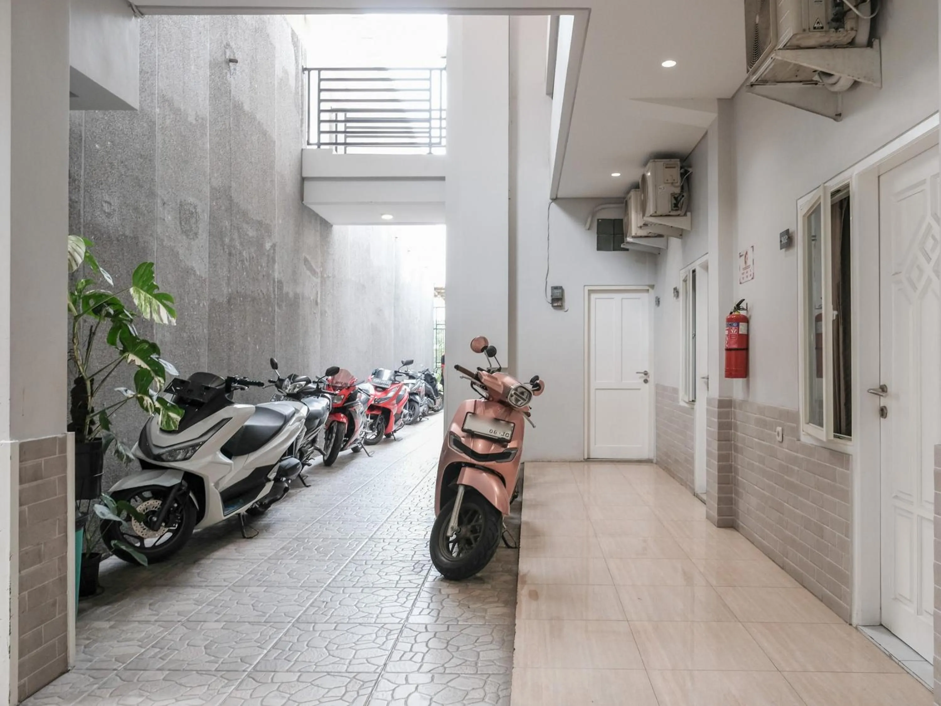 Parking in RedDoorz near Ciputra Golf Surabaya