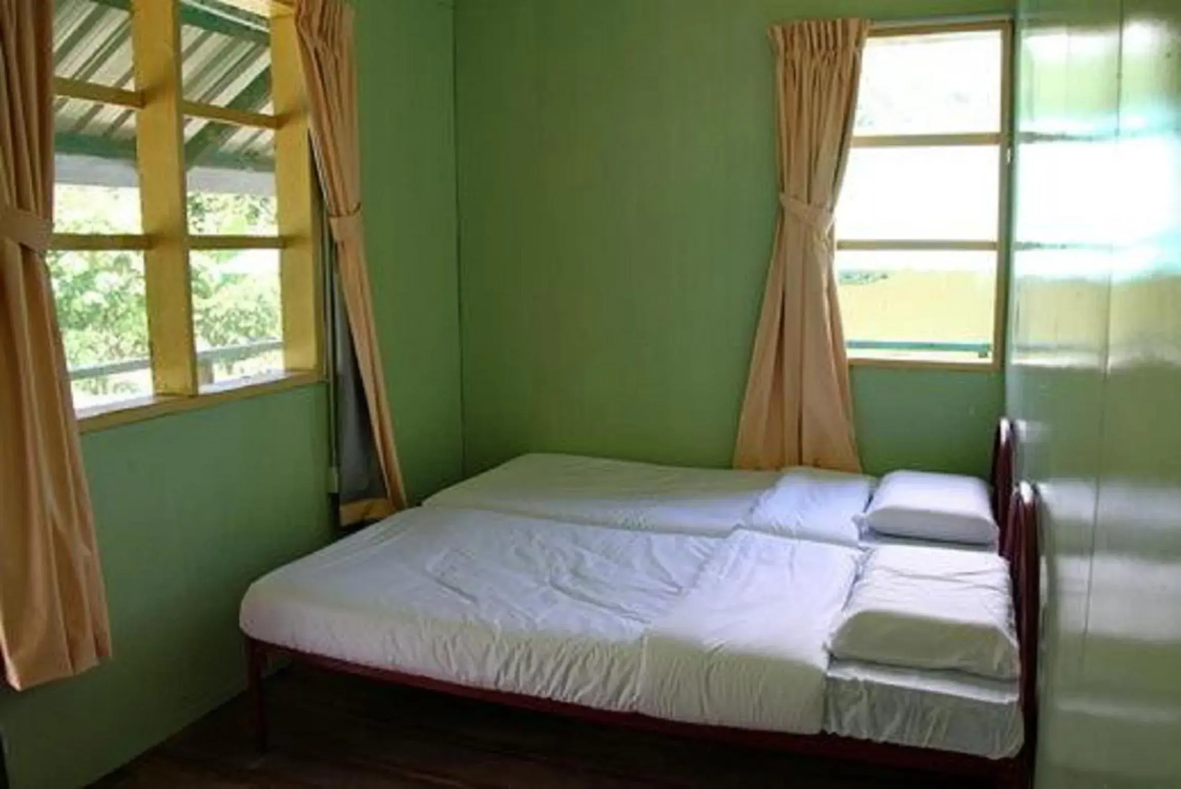 Bed in 4-Bed Family Dormitory Room in Kinabalu Poring Vacation Lodge Bed in 4-Bed Family Dormitory Room in Kinabalu Poring Vacation Lodge