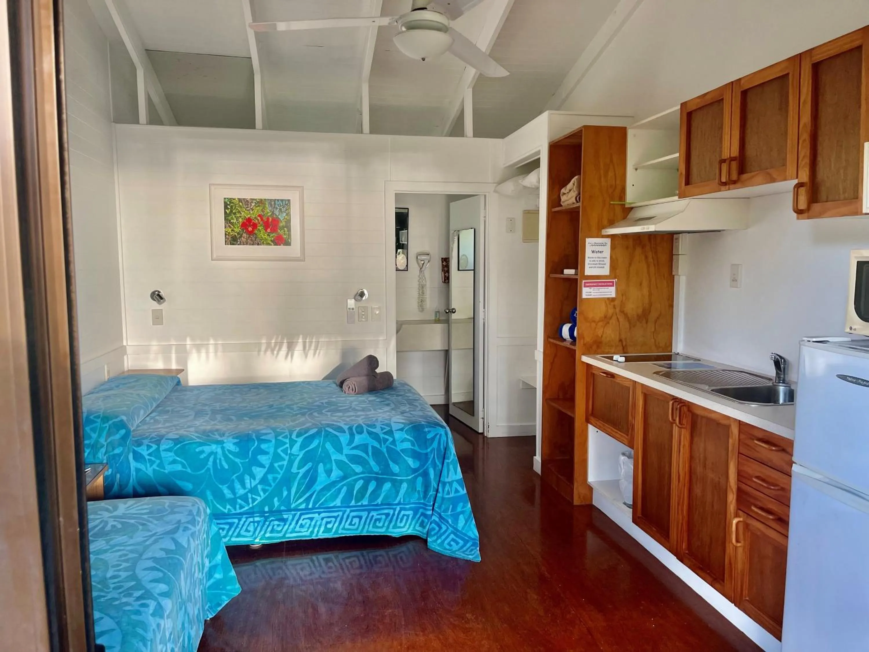 Bed in Aroa Beachside Resort