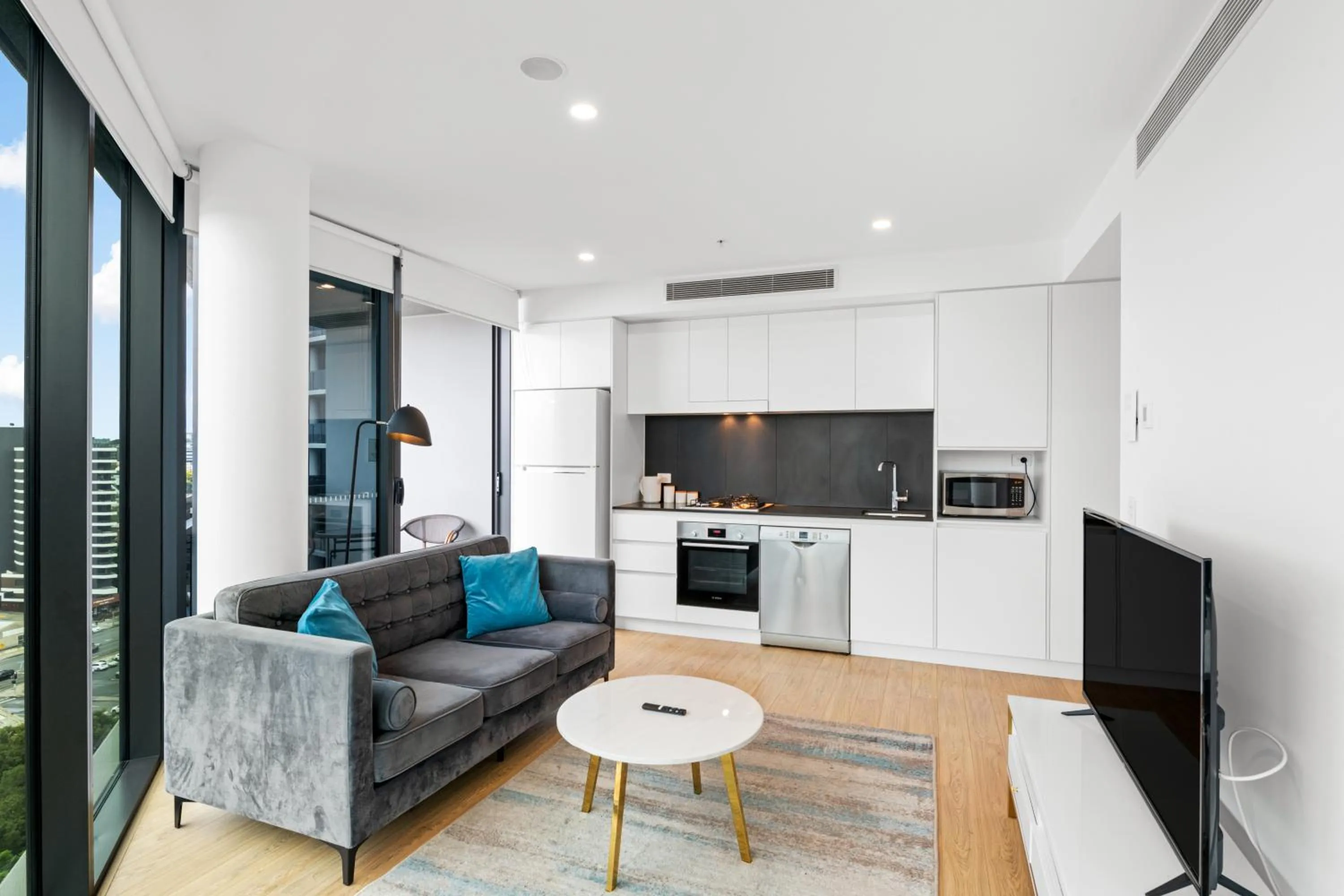 TV and multimedia in Brisbane One Apartments by CLLIX