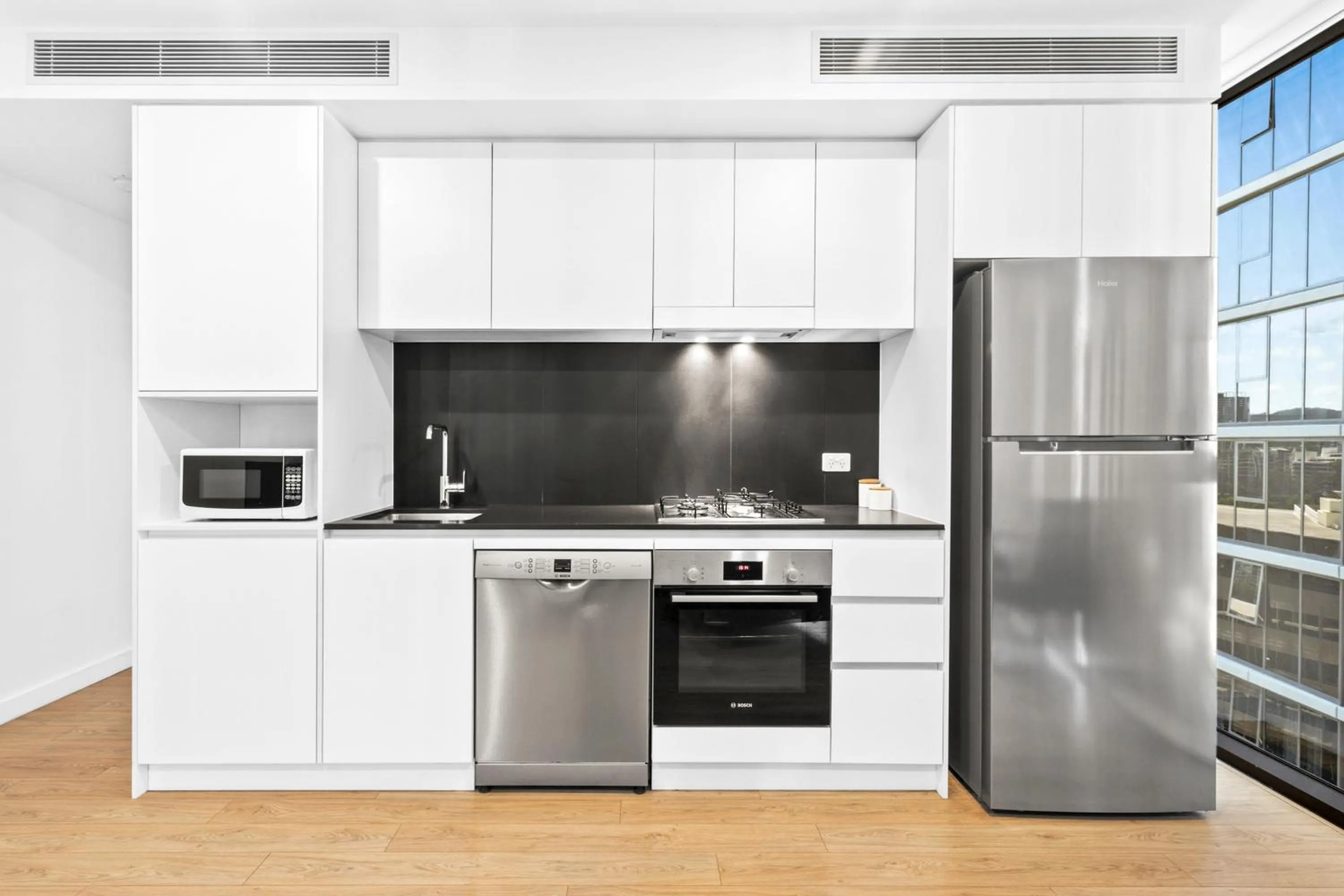 Kitchen or kitchenette in Brisbane One Apartments by CLLIX