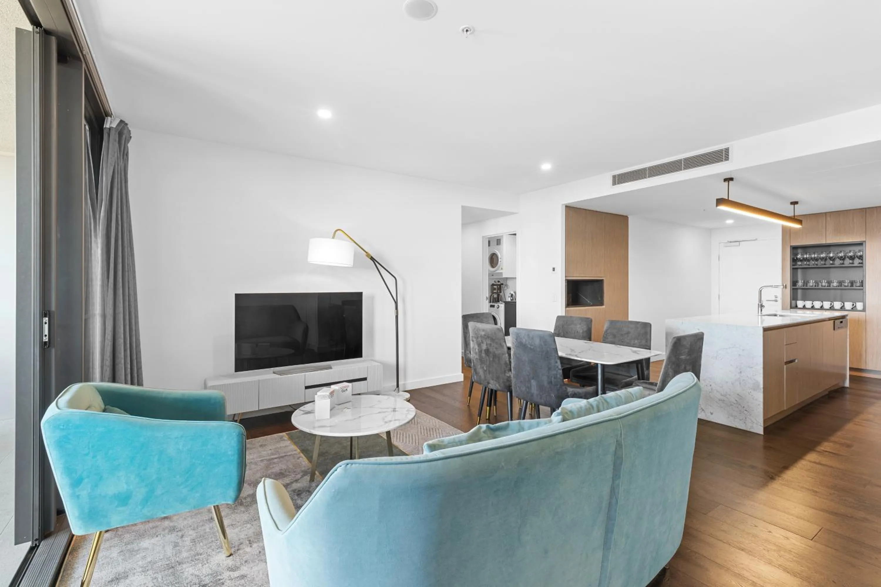 Living room in Brisbane One Apartments by CLLIX