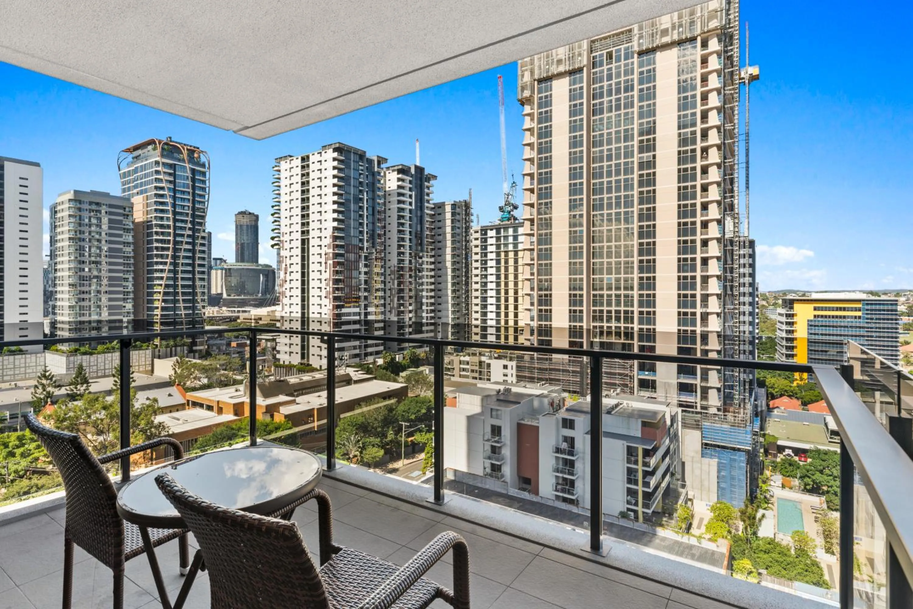 Balcony/Terrace in Brisbane One Apartments by CLLIX