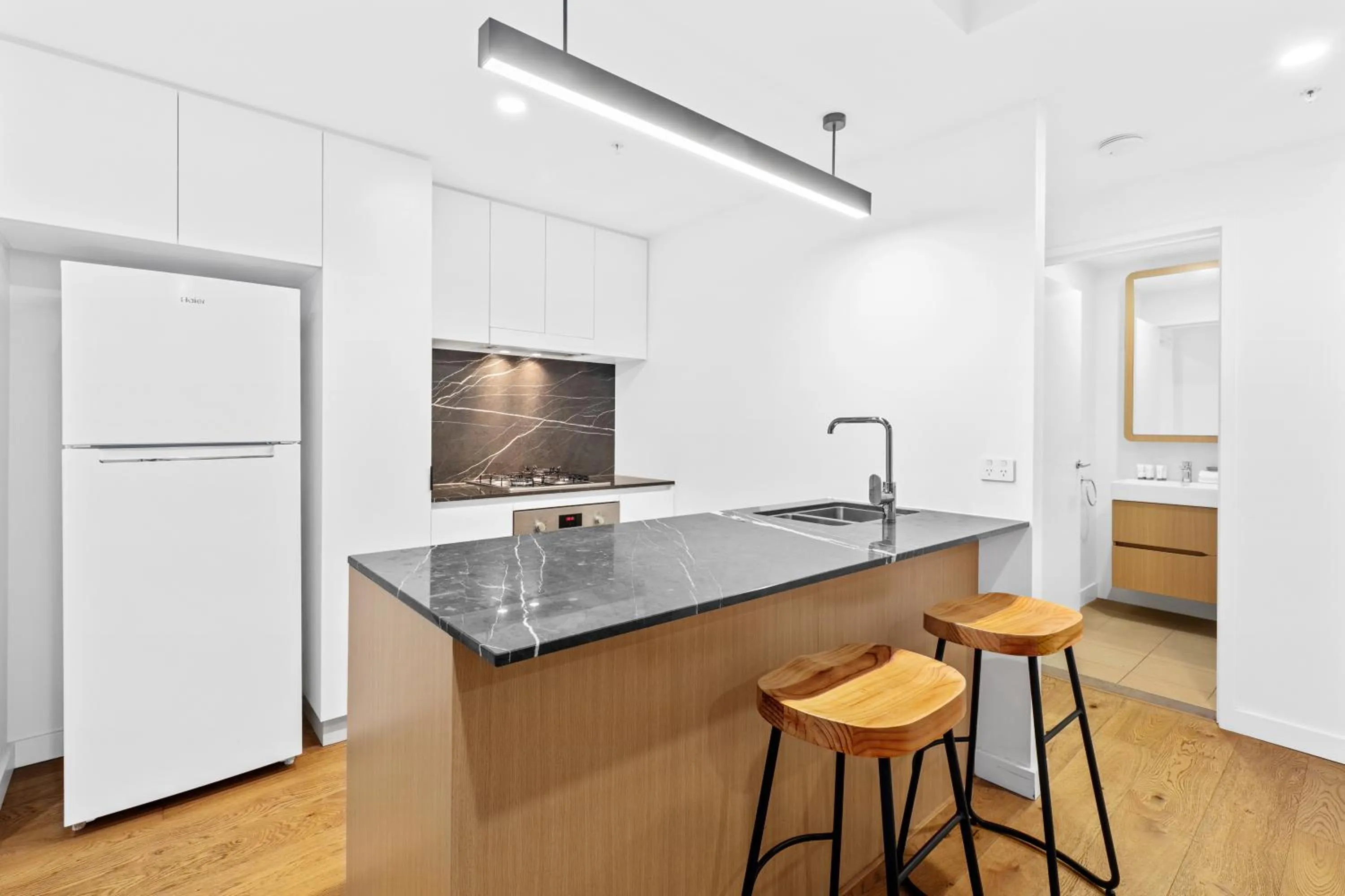 Kitchen or kitchenette in Brisbane One Apartments by CLLIX