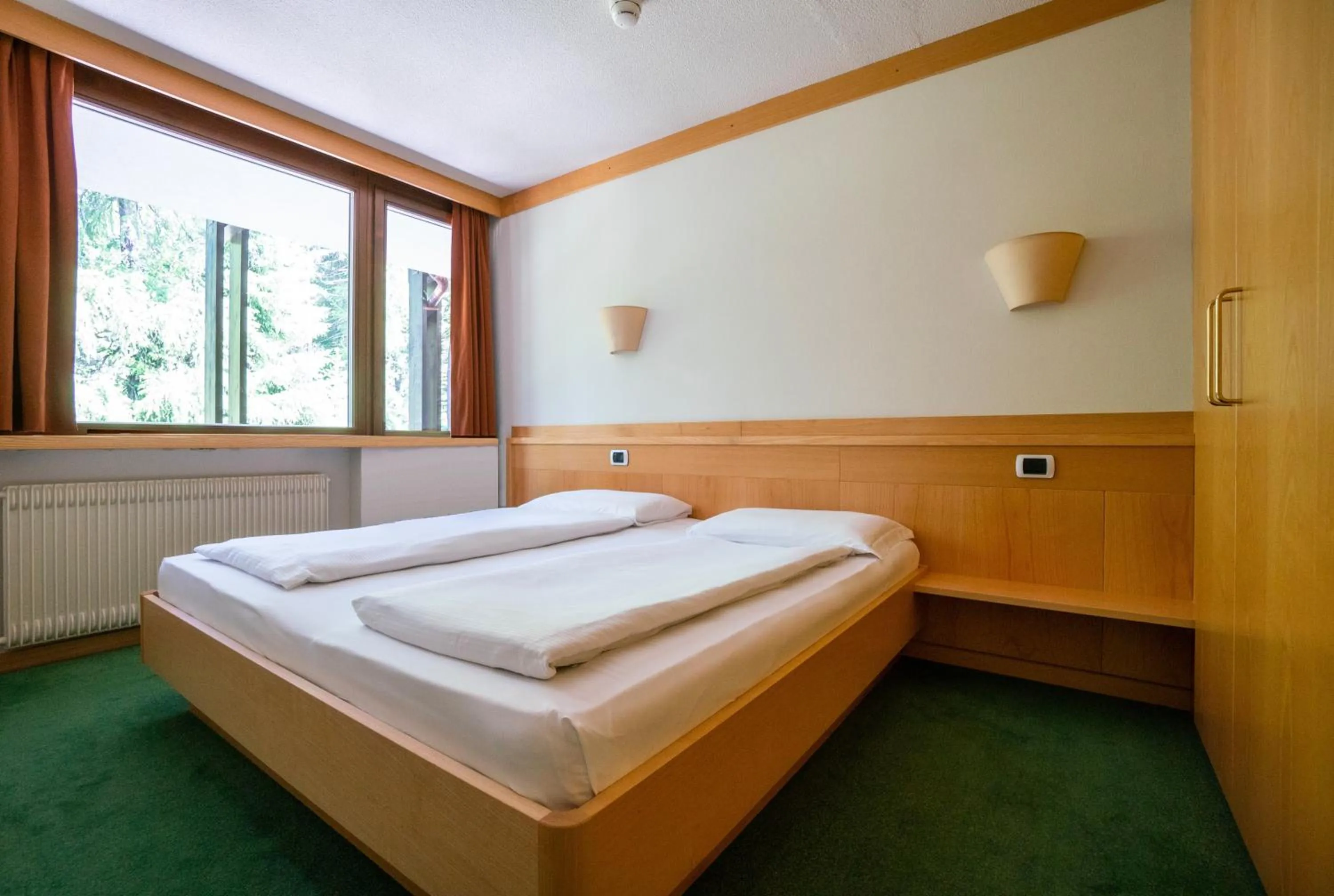 Bed in Ambiez Residencehotel