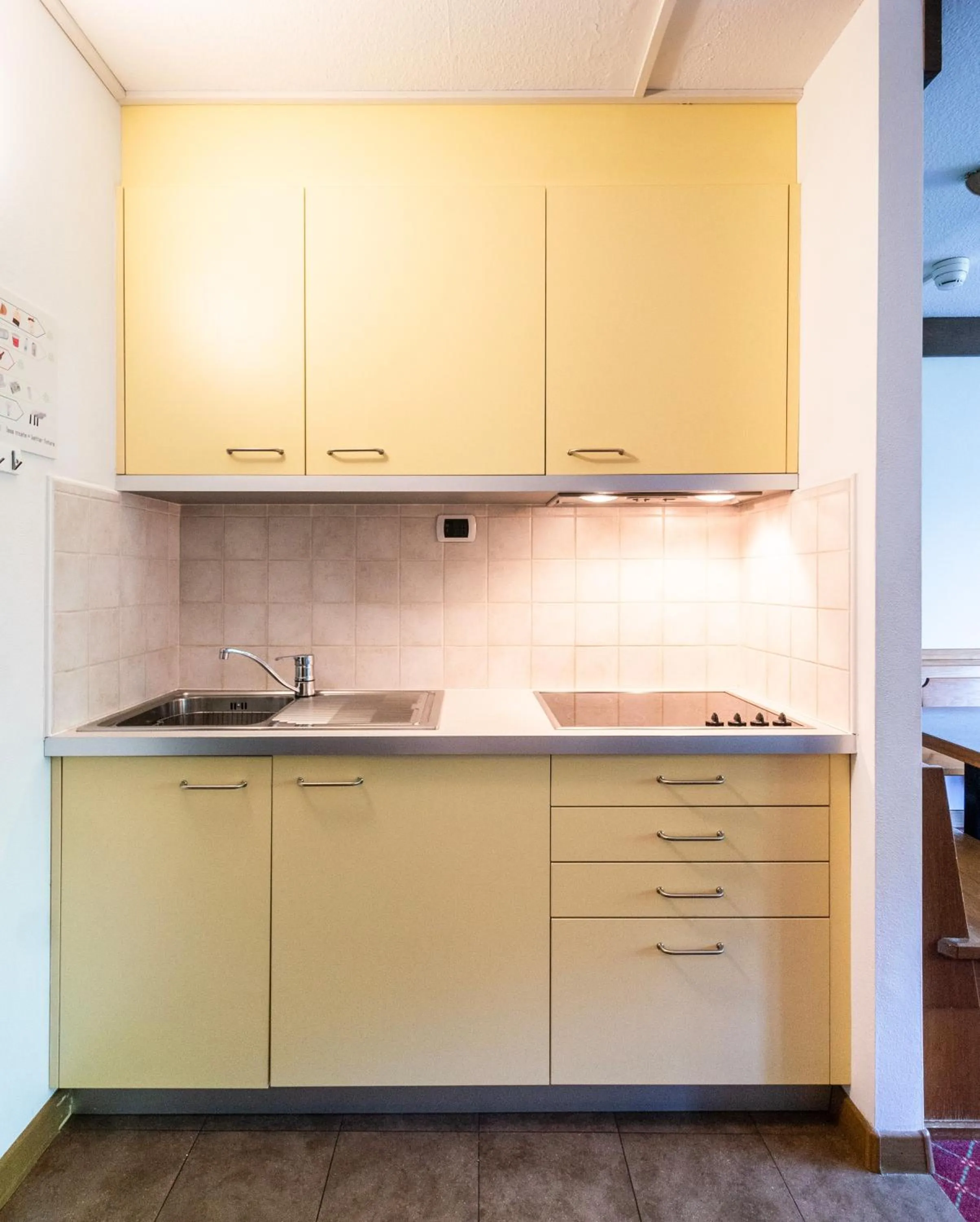 Kitchen or kitchenette in Ambiez Residencehotel