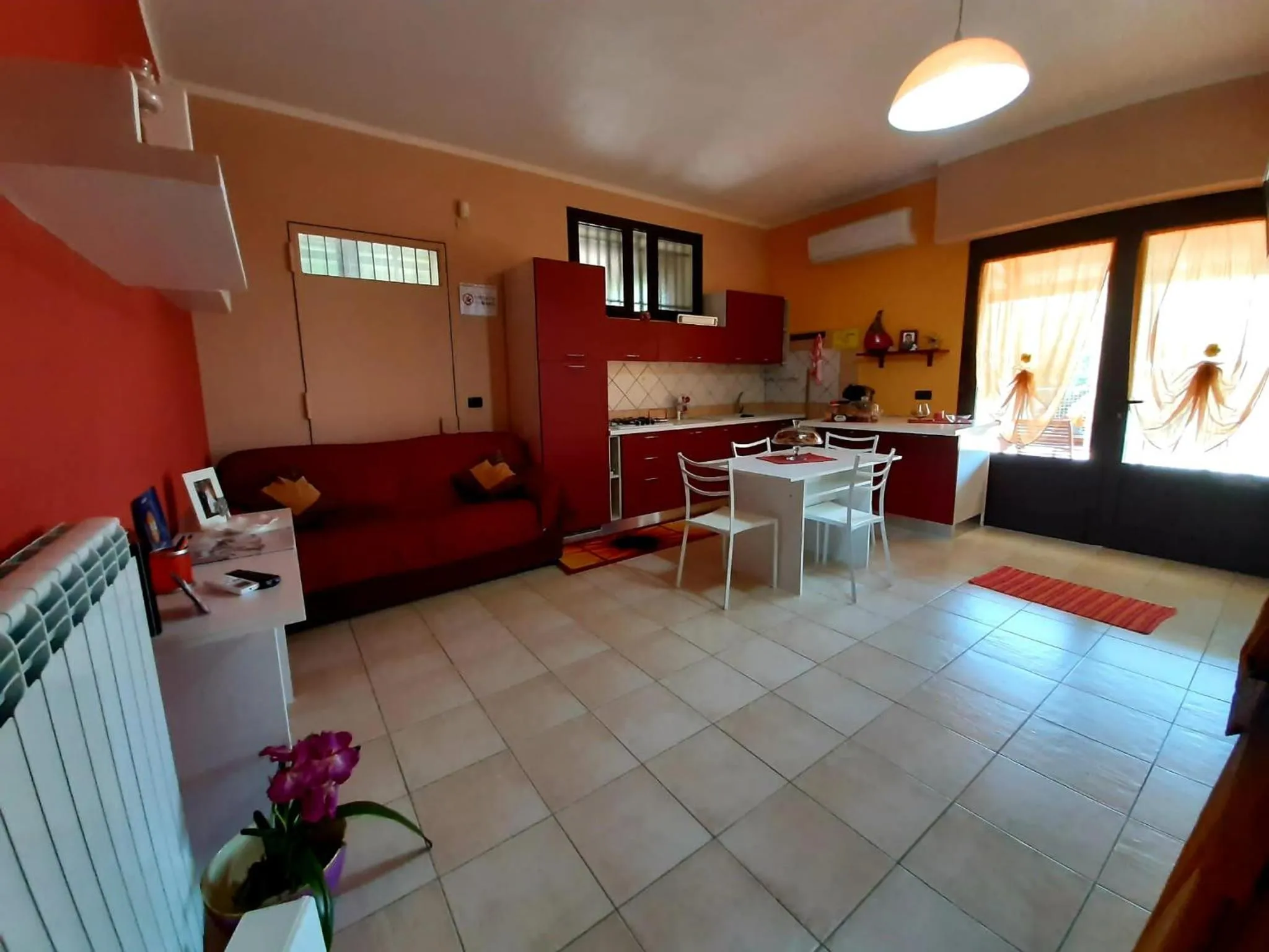 Kitchen or kitchenette in B&b Villa Santa Sofia by holidayngo