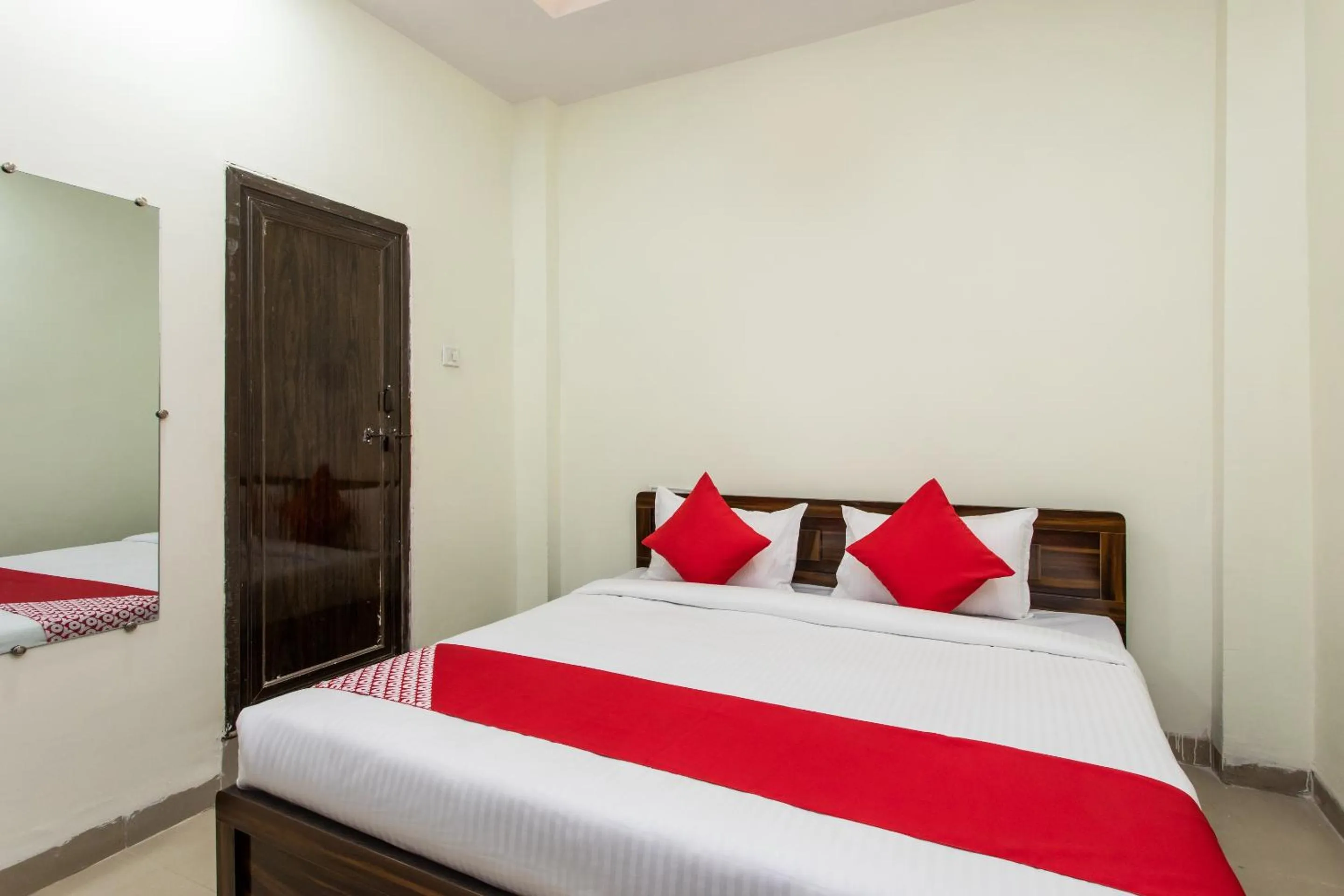 Bedroom in Hotel O Manjulam Regency