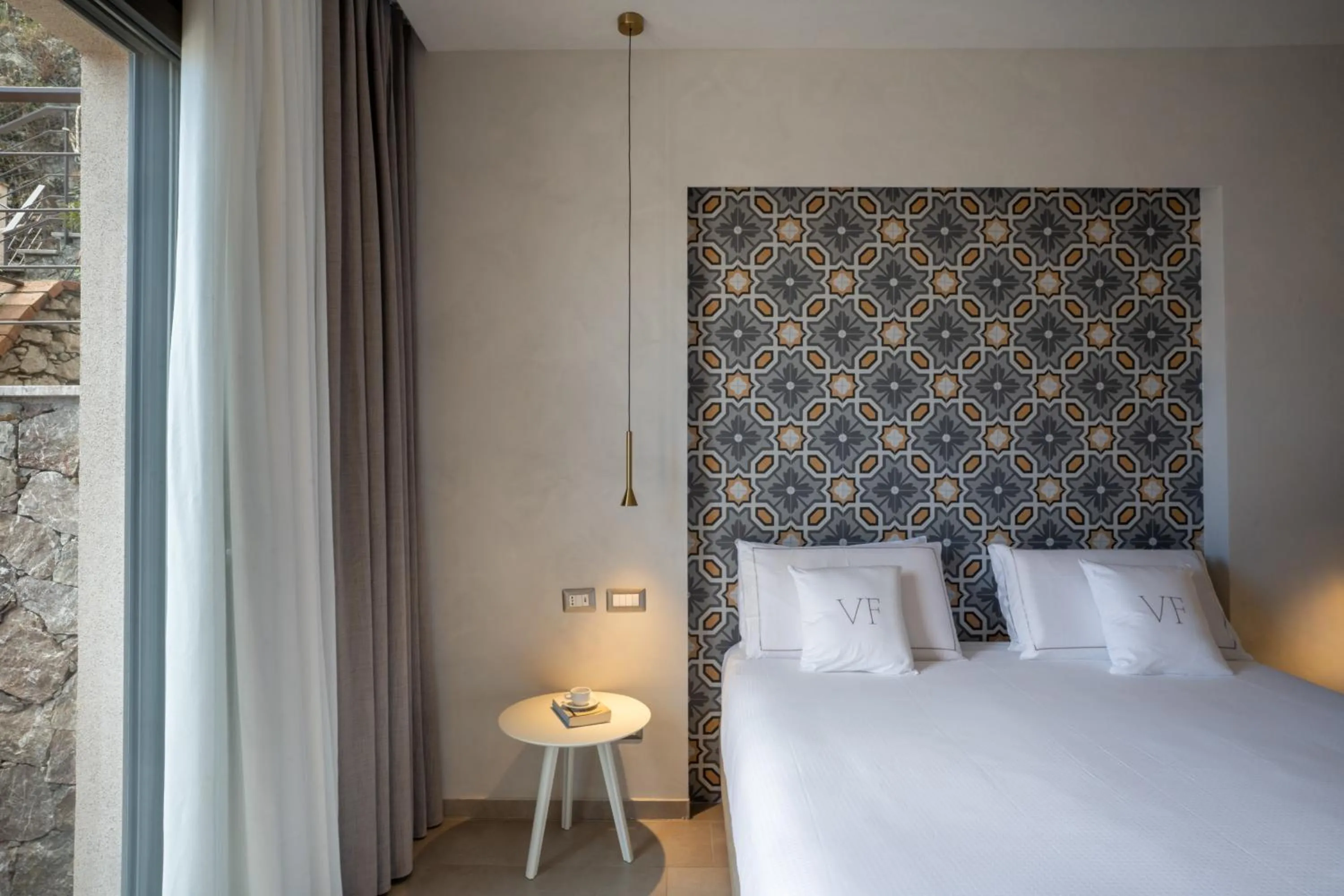 Bed in Villa Fiorita Boutique Hotel