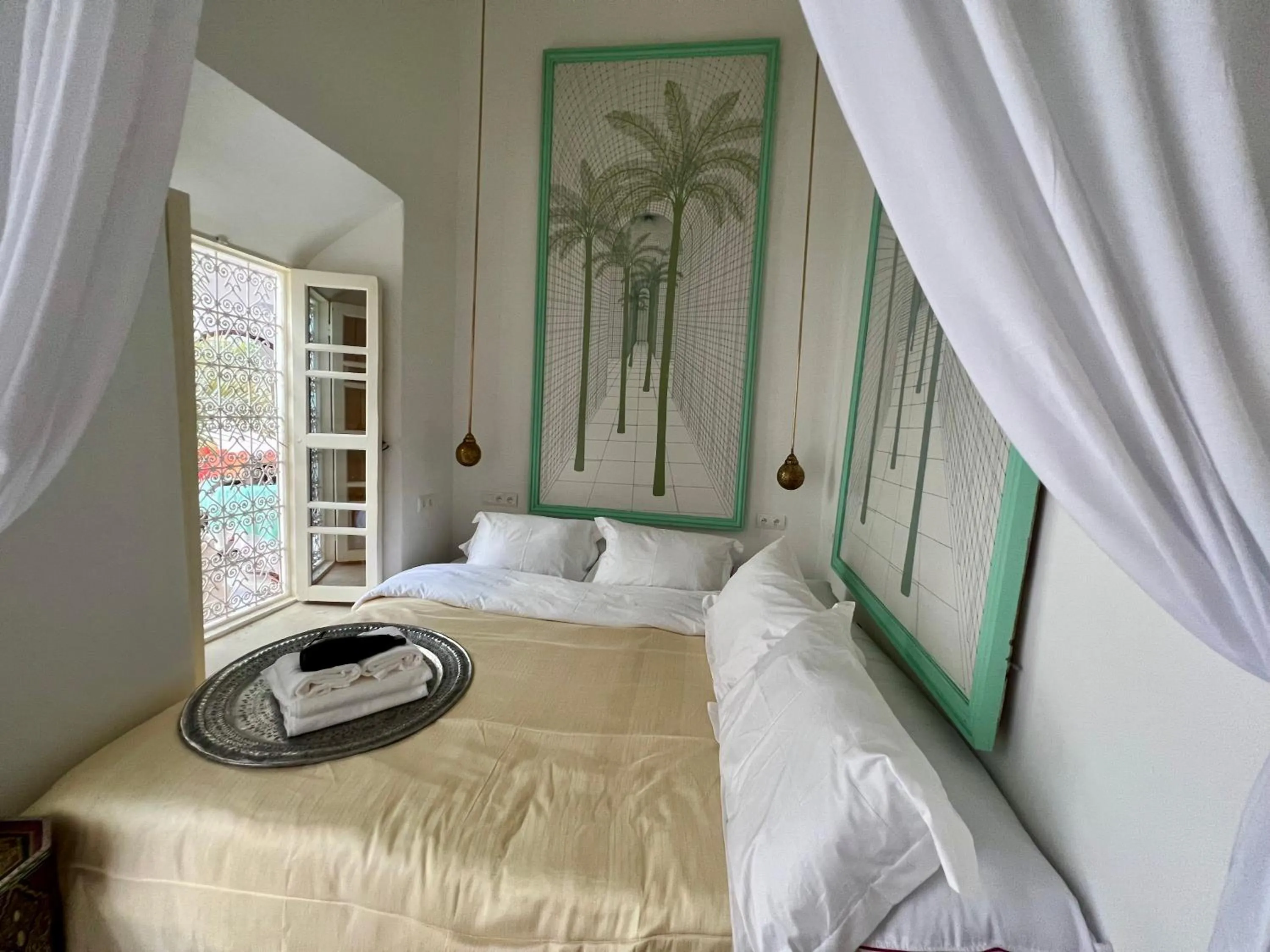 Decorative detail, Bed in Riad Tizwa Marrakech