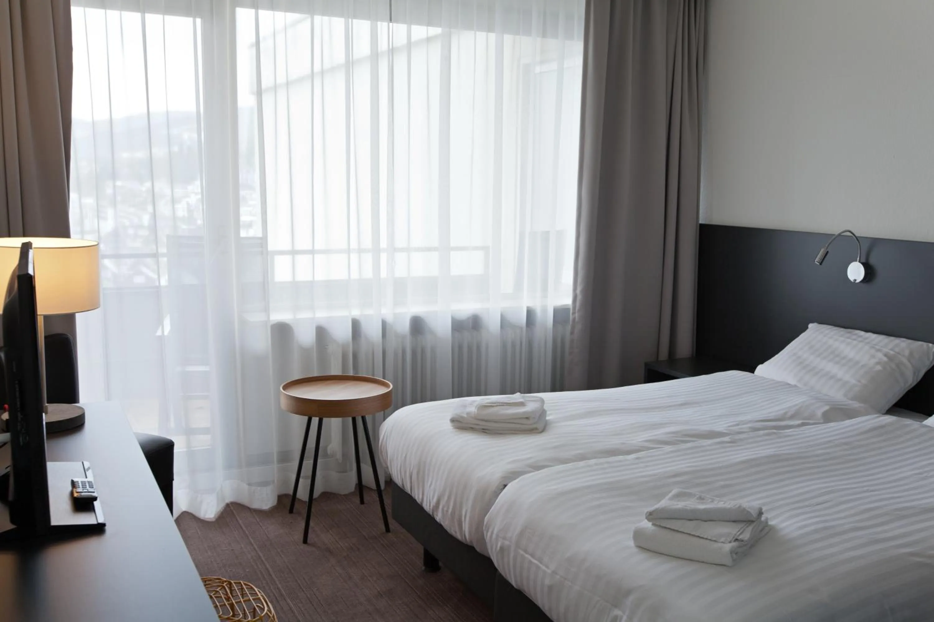 Bed in Hotel AM Fang