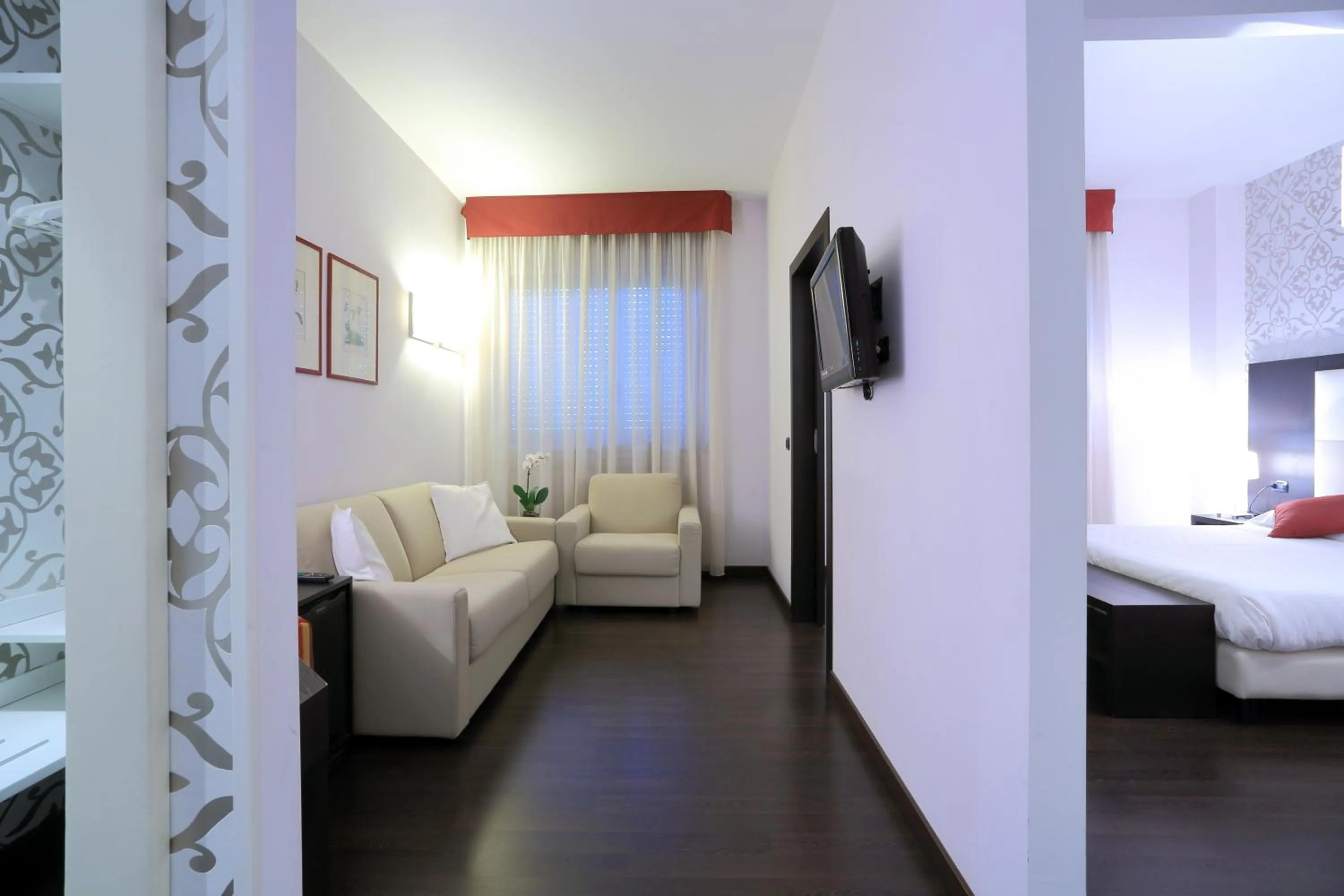 Living room, Bed in Hotel La Torretta