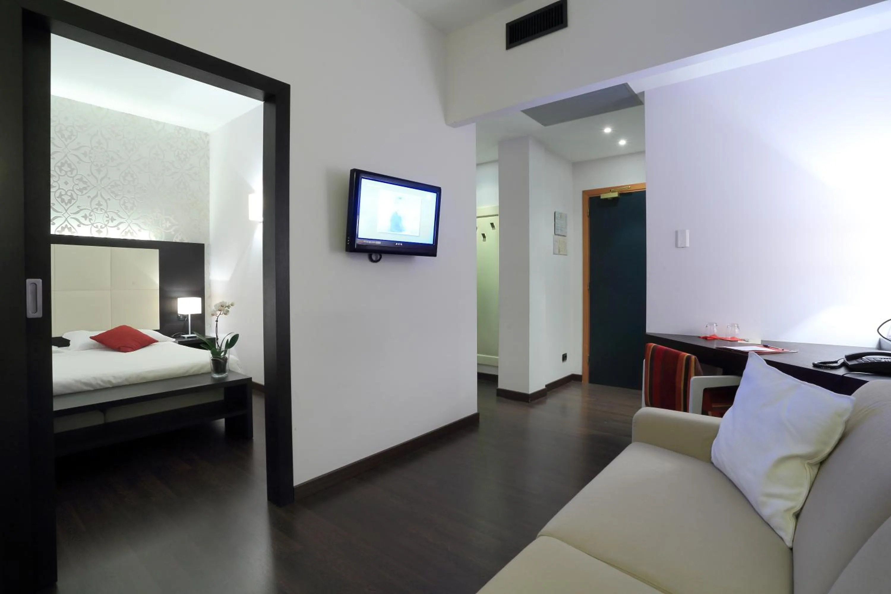 Living room, Bed in Hotel La Torretta