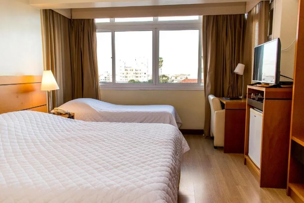 Bed in Hotel Jacques Georges Business