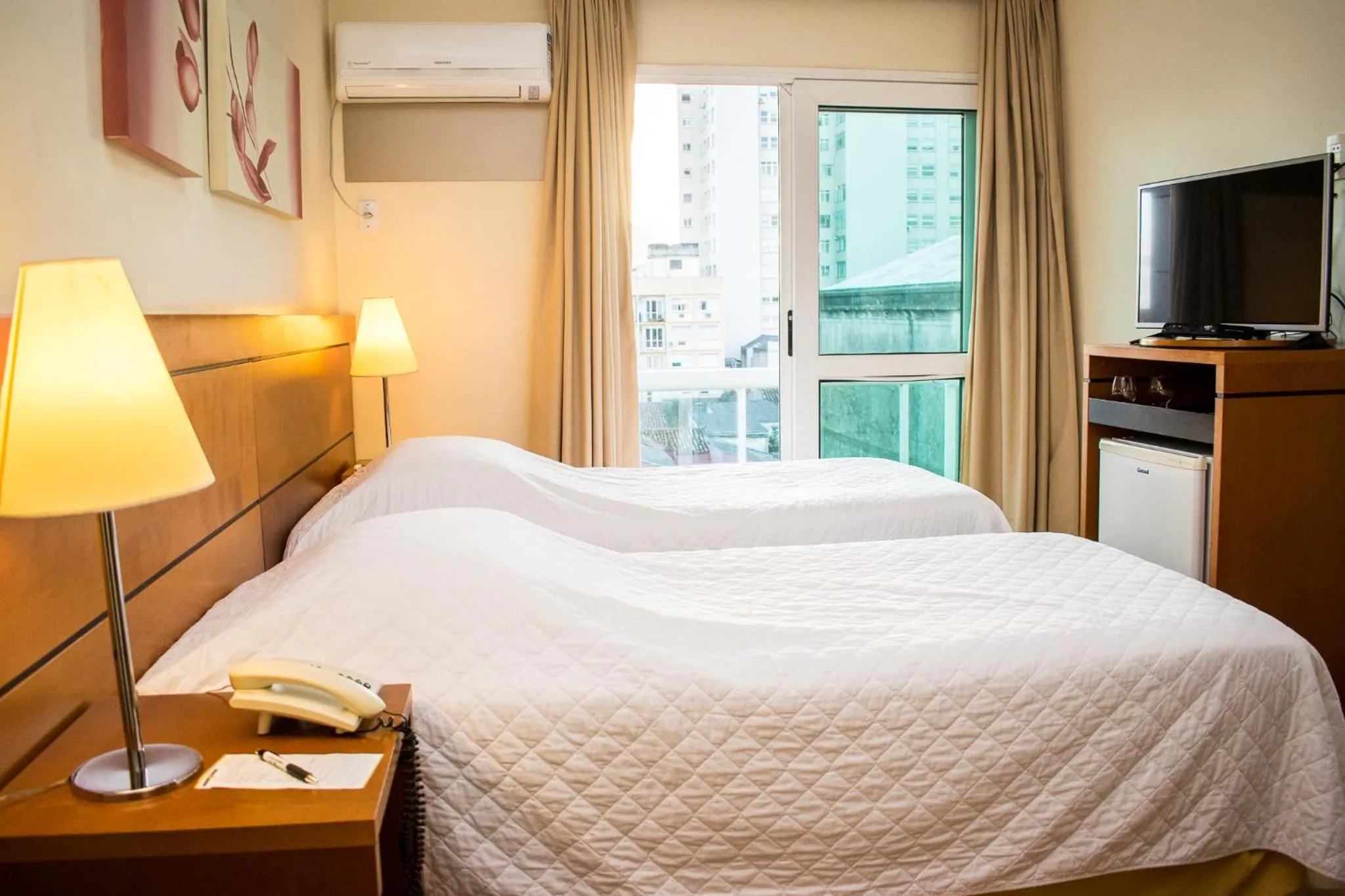 Bed in Hotel Jacques Georges Business