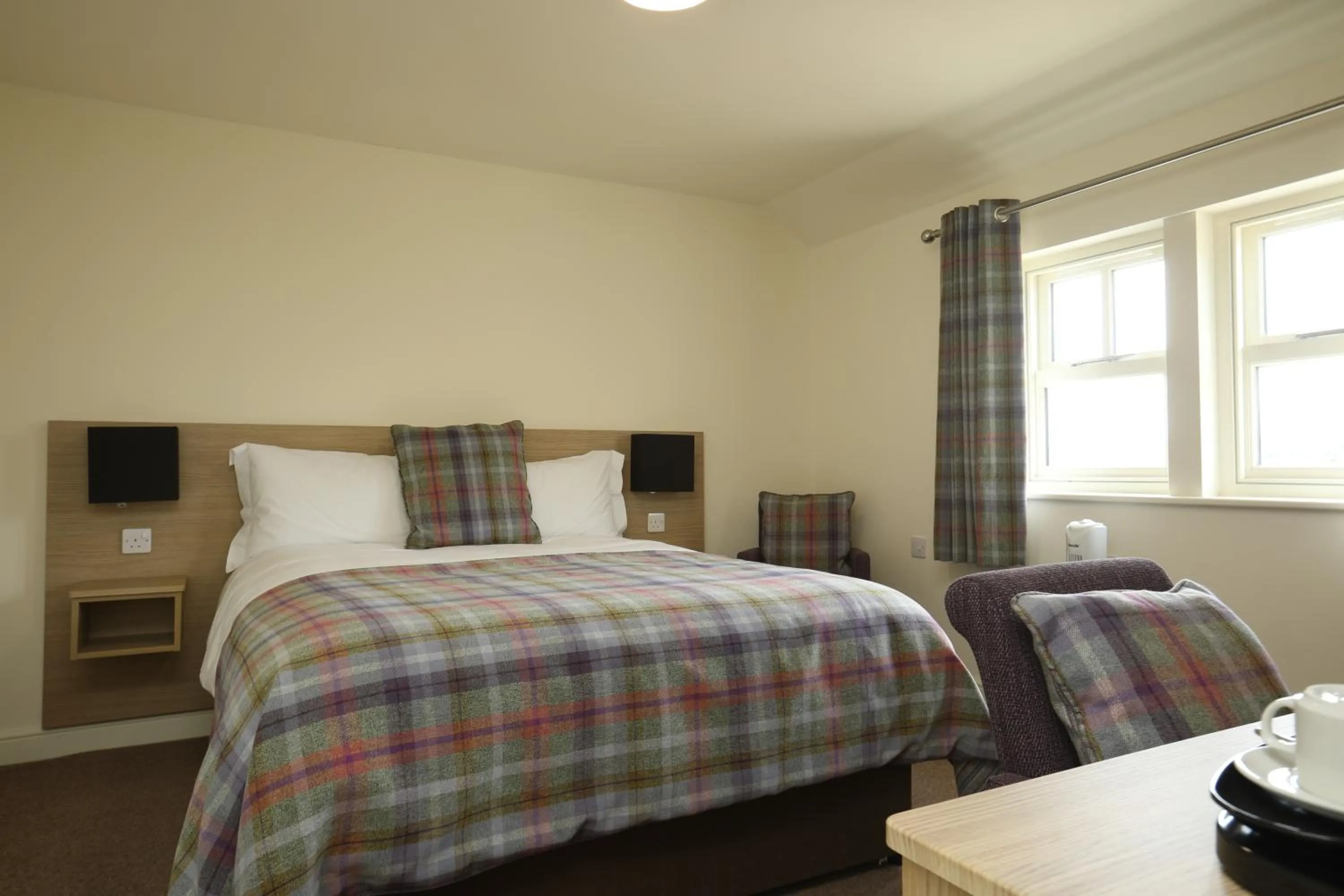 Bed in The Craven Heifer Inn