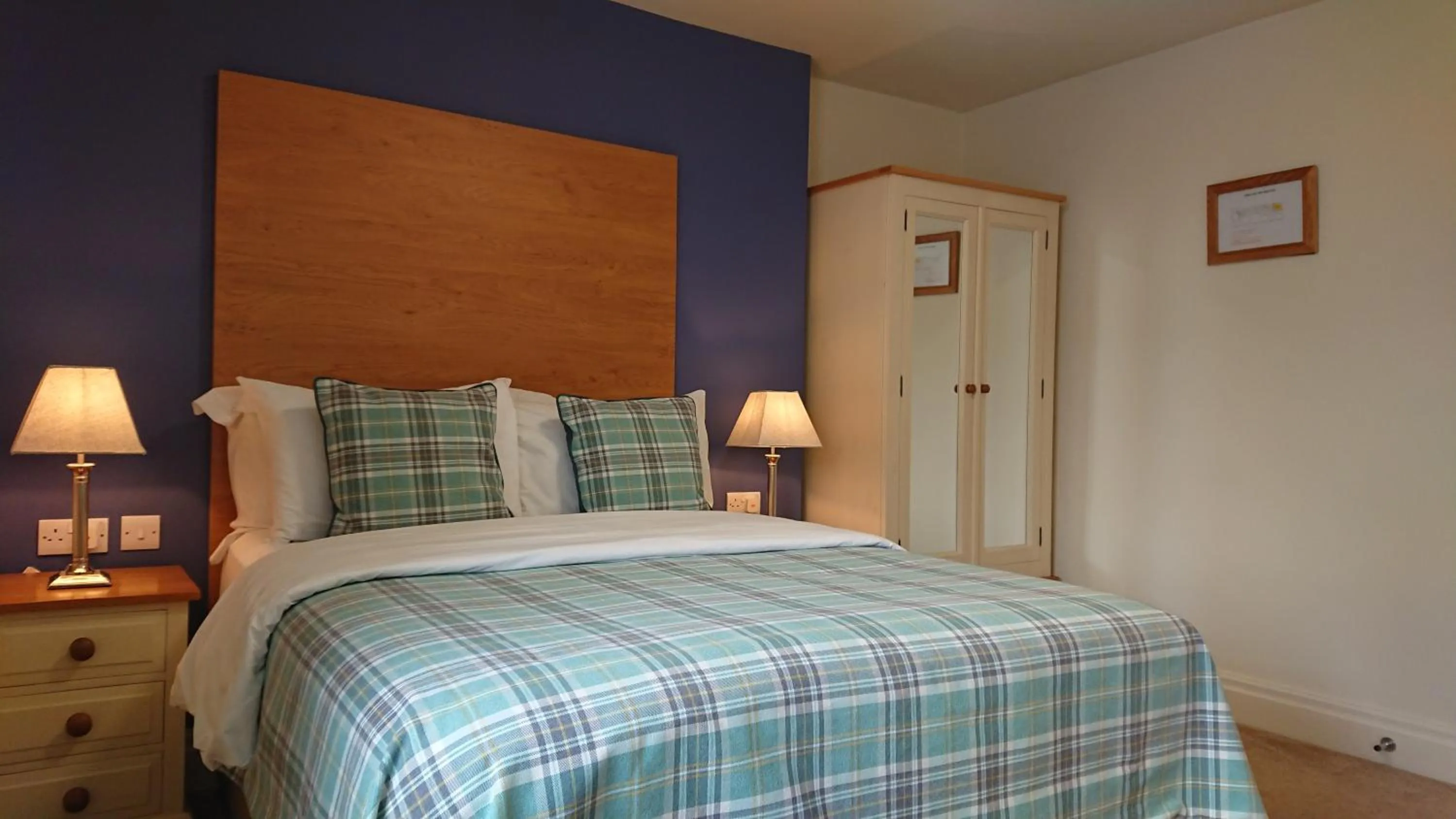 Bed in The Craven Heifer Inn