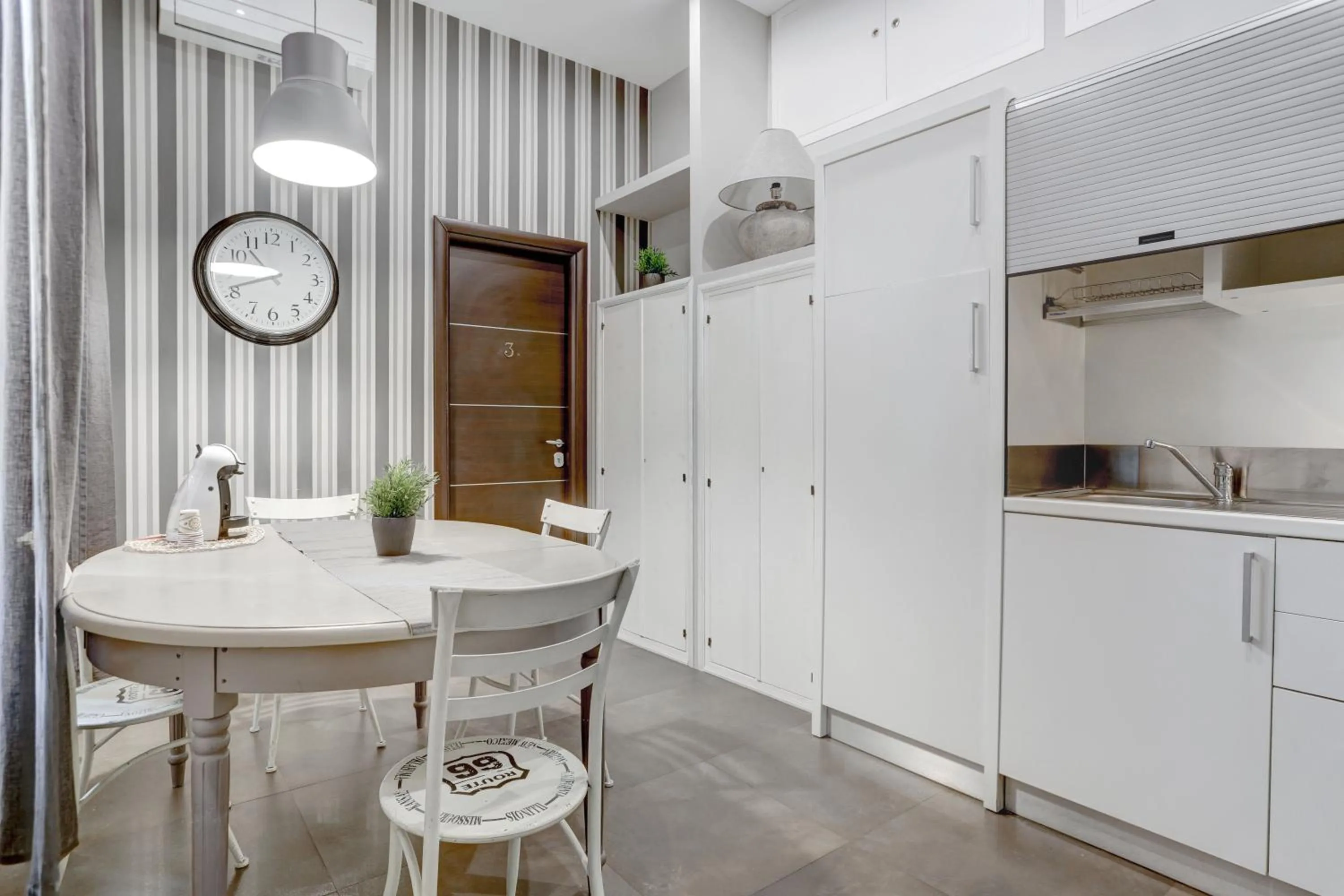 Kitchen or kitchenette in CAPO D'AFRICA 30 - COLOSSEO