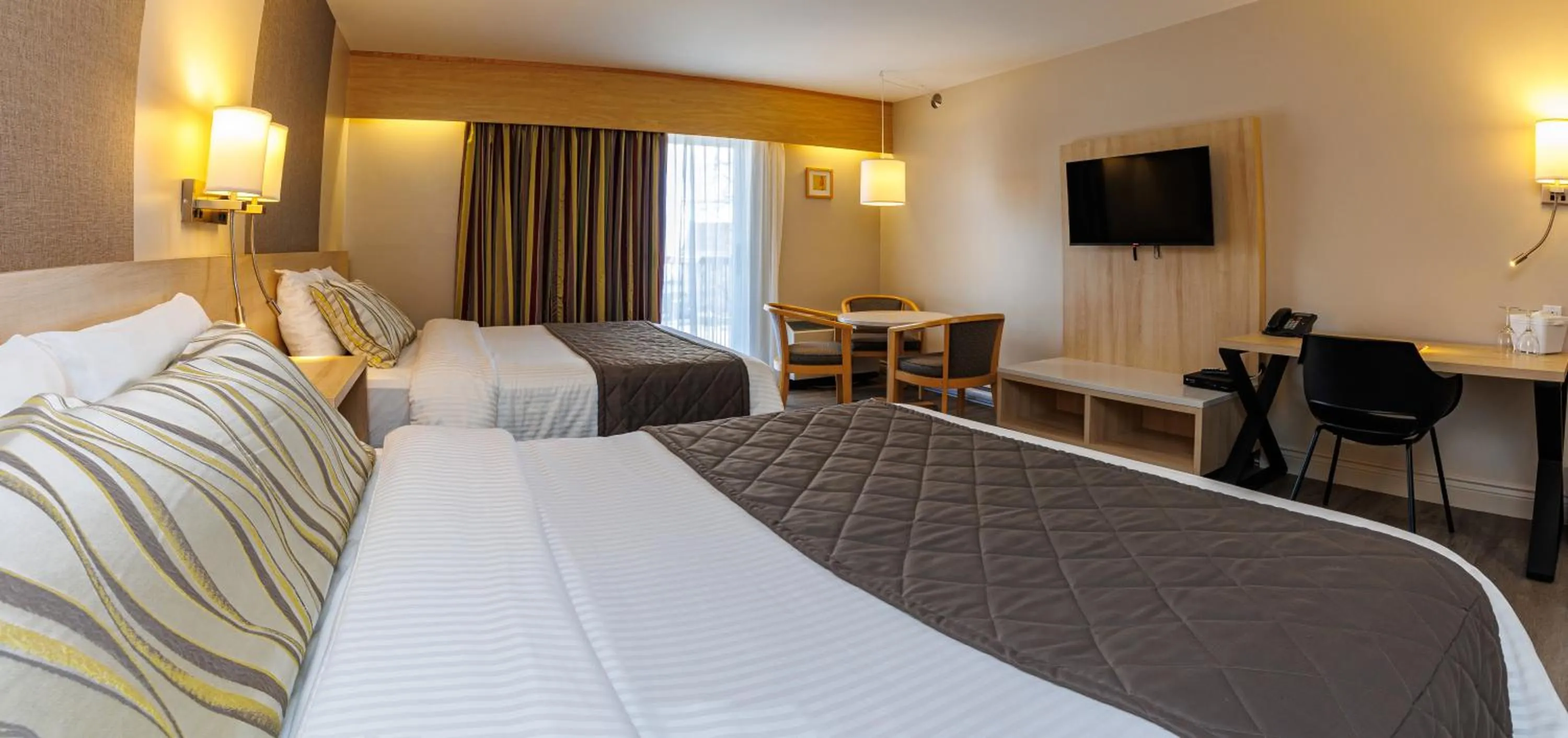 Bed in Hôtel-Motel Castel de la Mer