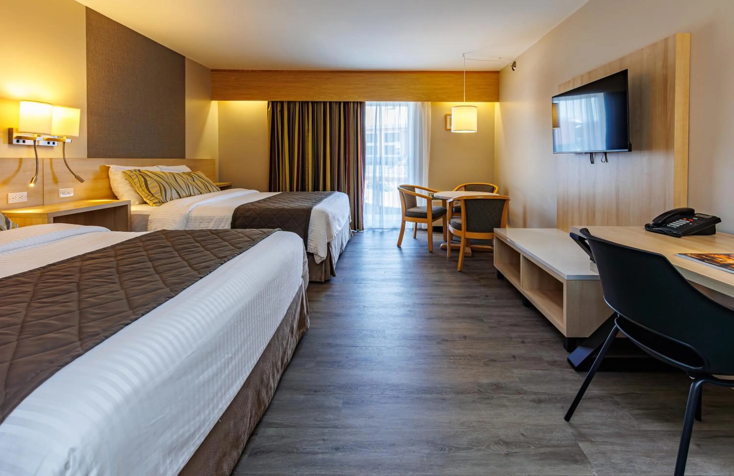 Bed in Hôtel-Motel Castel de la Mer