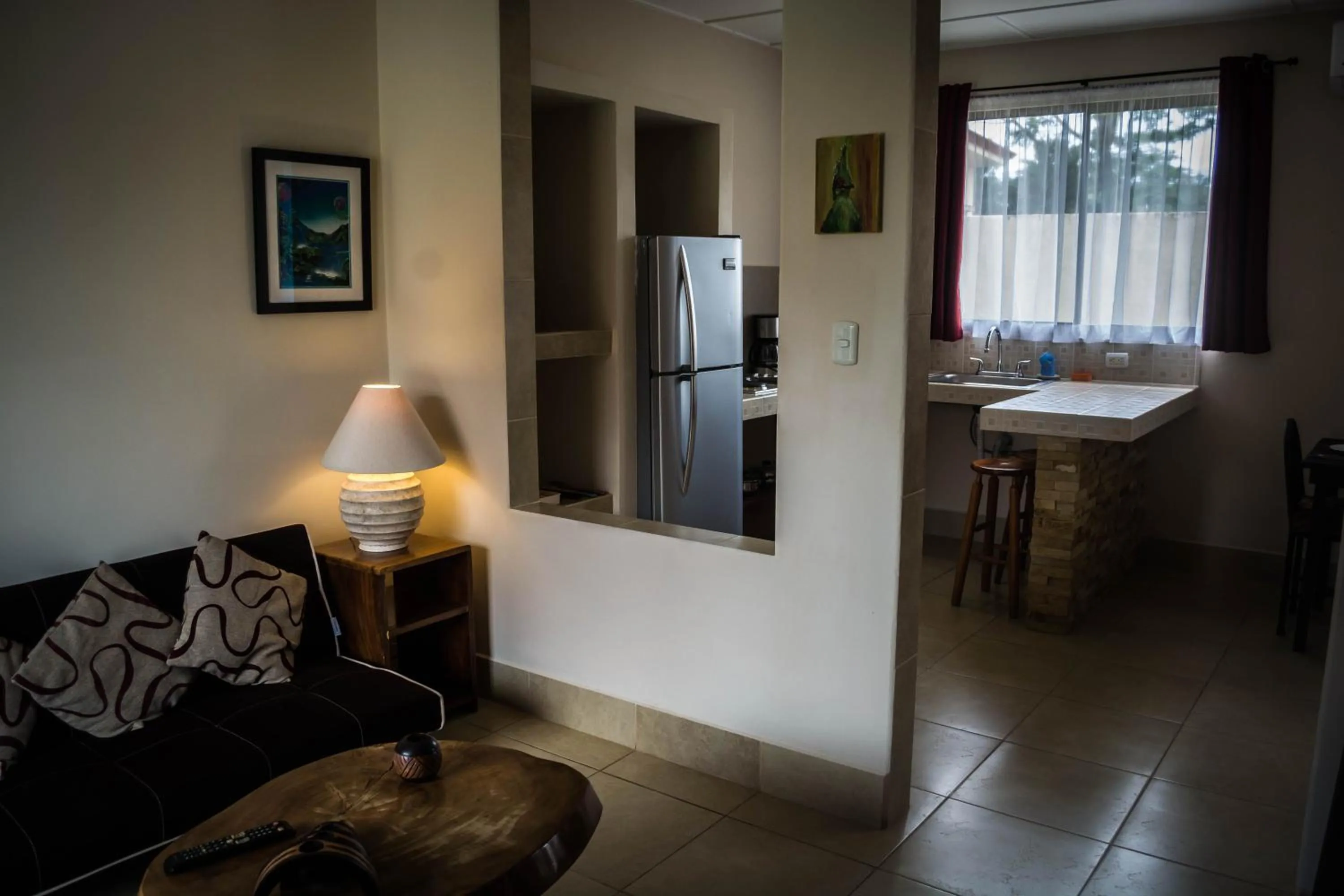 Communal lounge/ TV room in Villa Creole