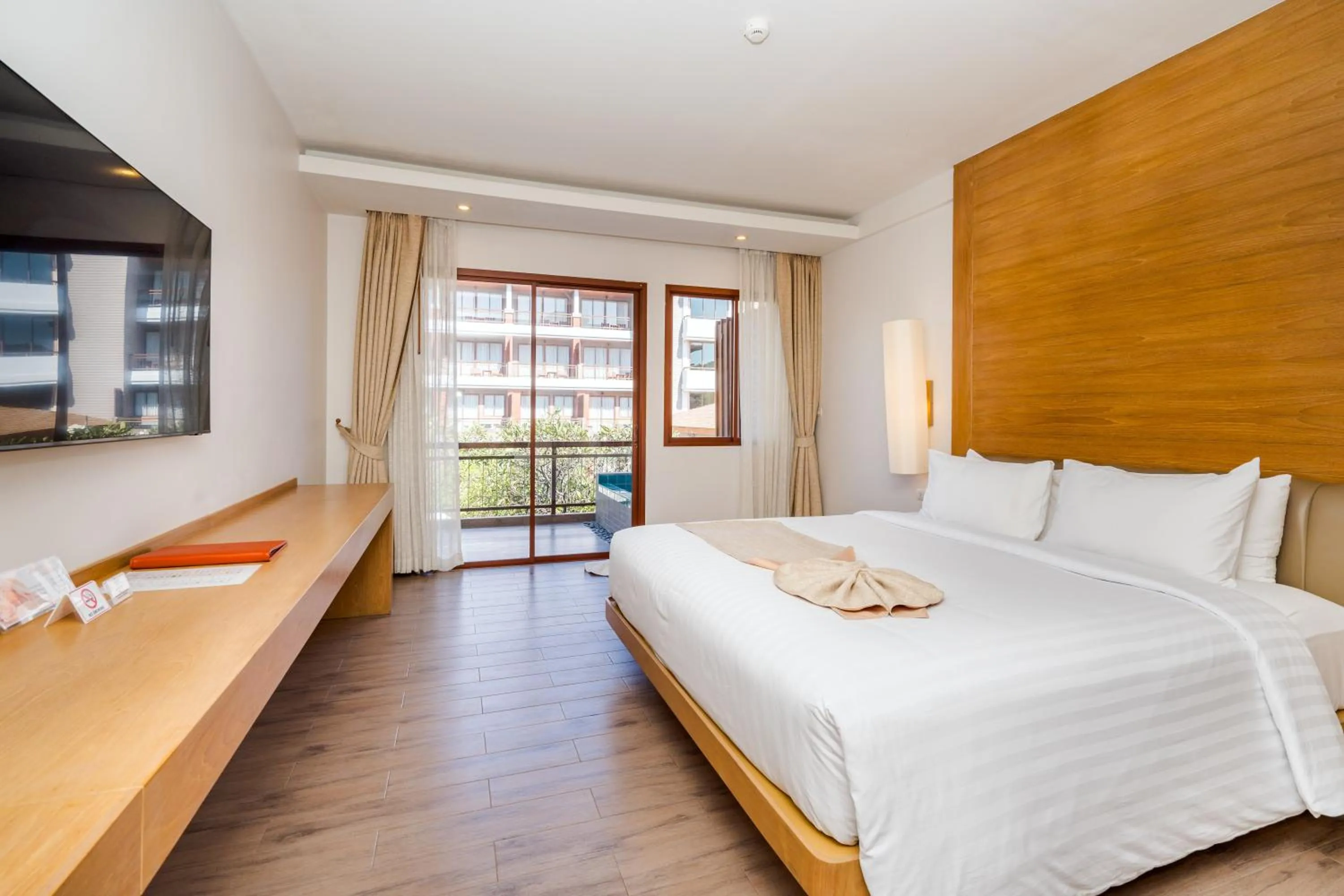 Bed in Ayrest Hua Hin Hotel