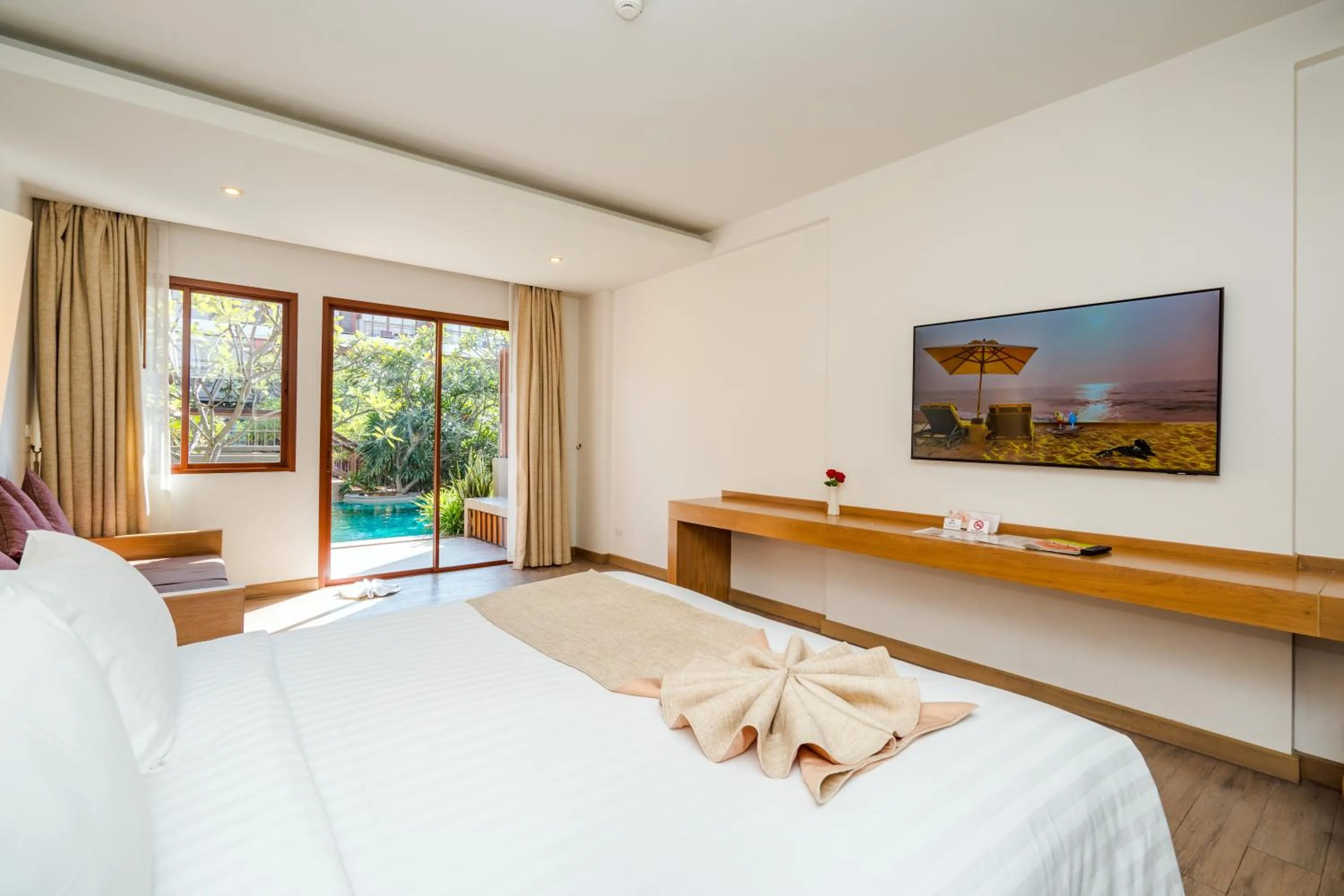 Bed in Ayrest Hua Hin Hotel