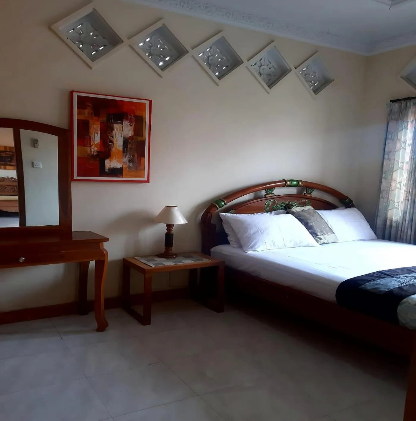 Bed in The Reinhold Guesthouse Bali