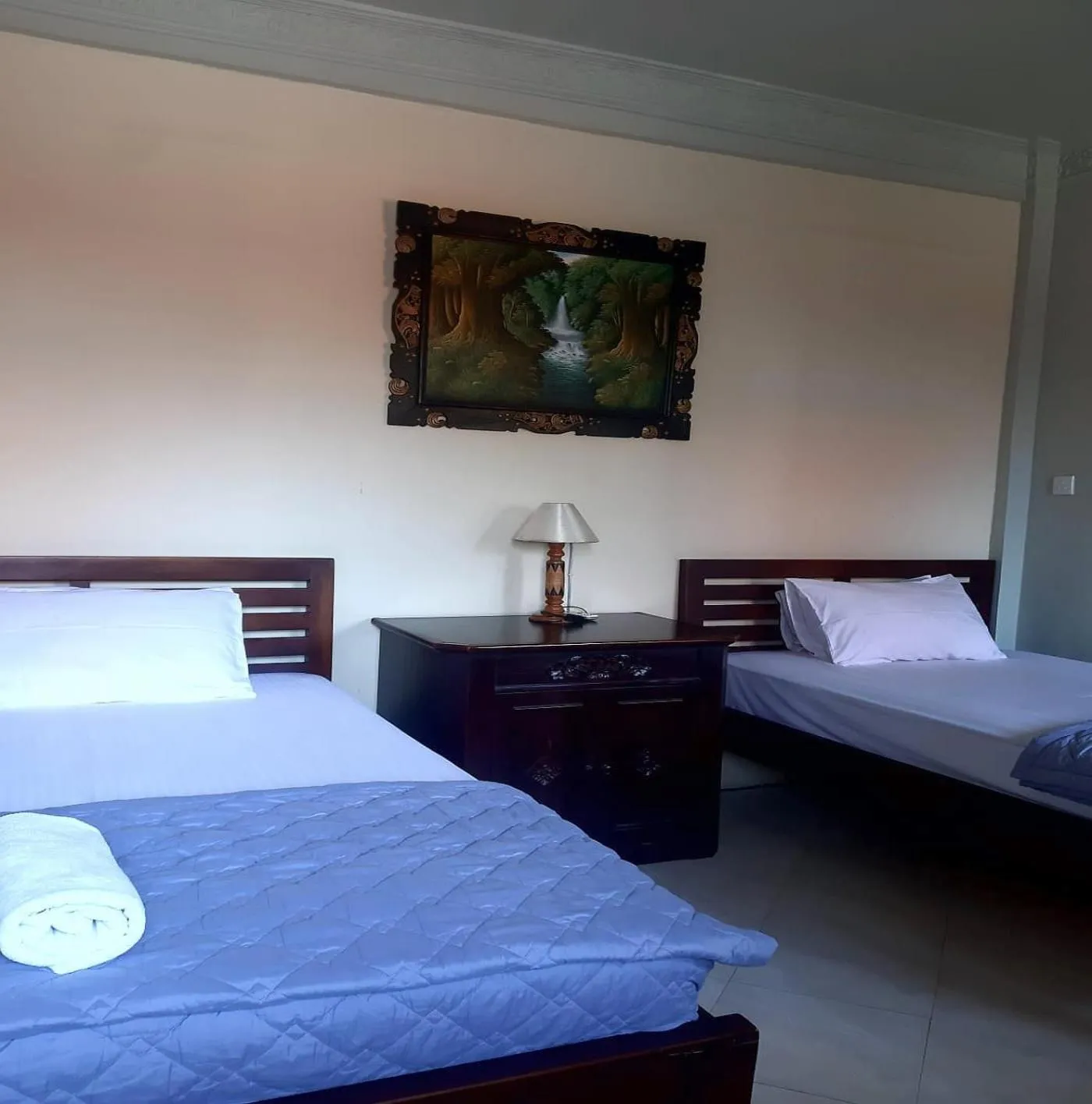 Bed in The Reinhold Guesthouse Bali