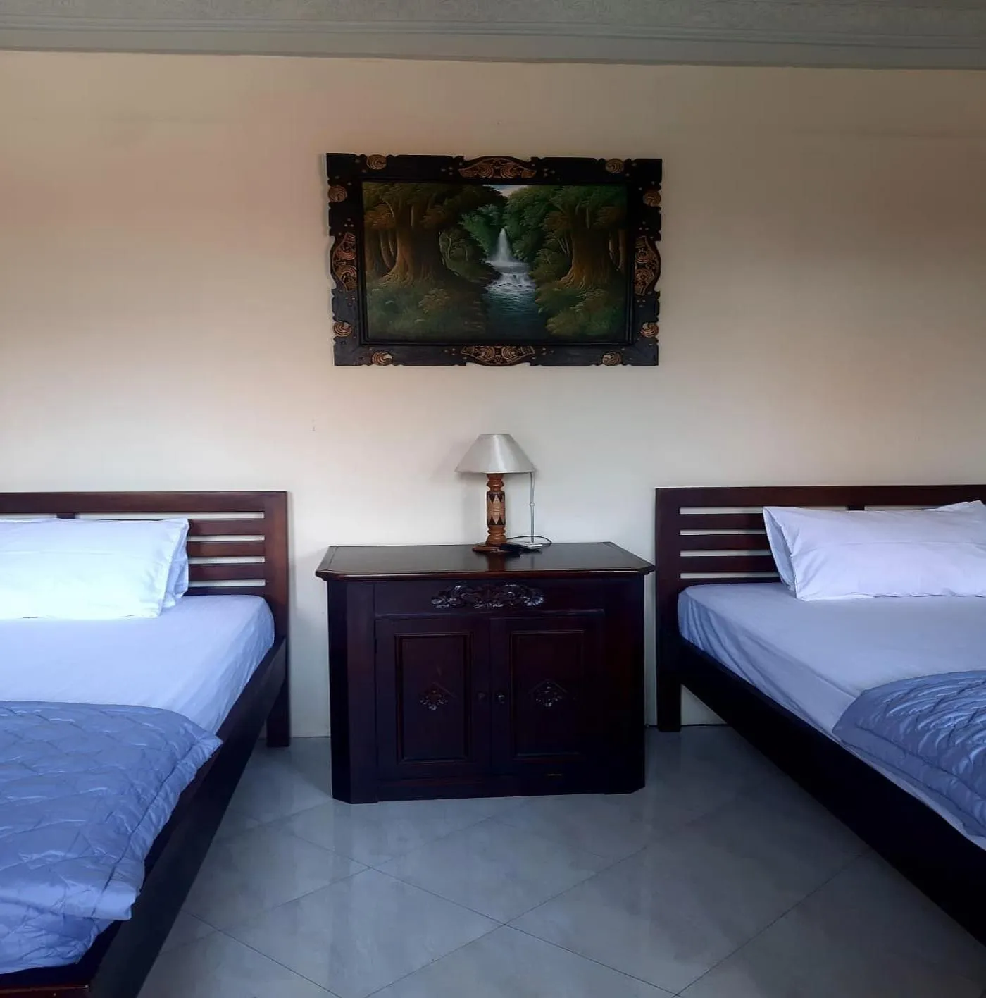 Photo of the whole room, Bed in The Reinhold Guesthouse Bali