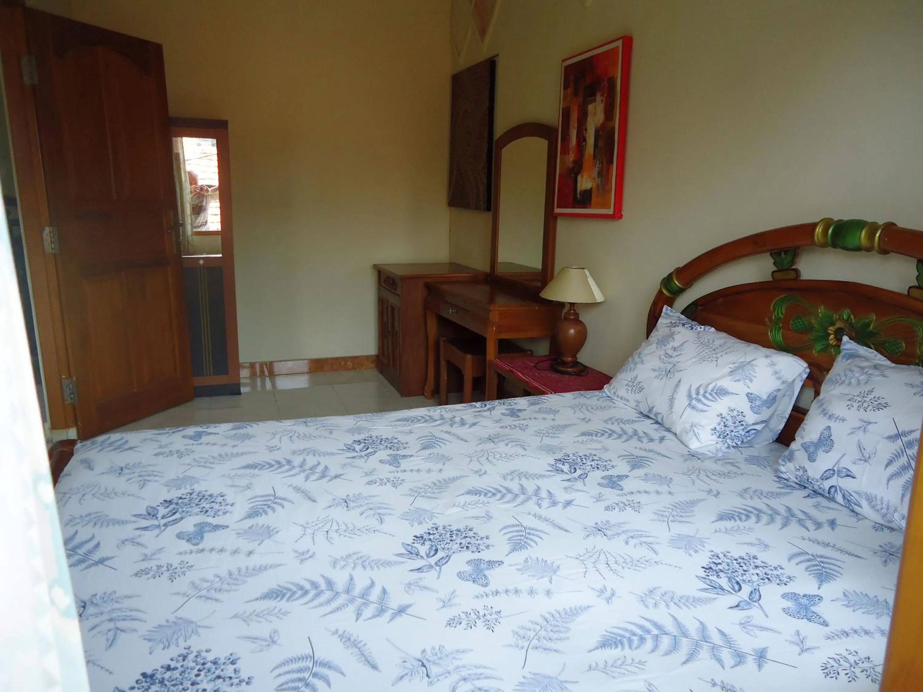 Bed in The Reinhold Guesthouse Bali