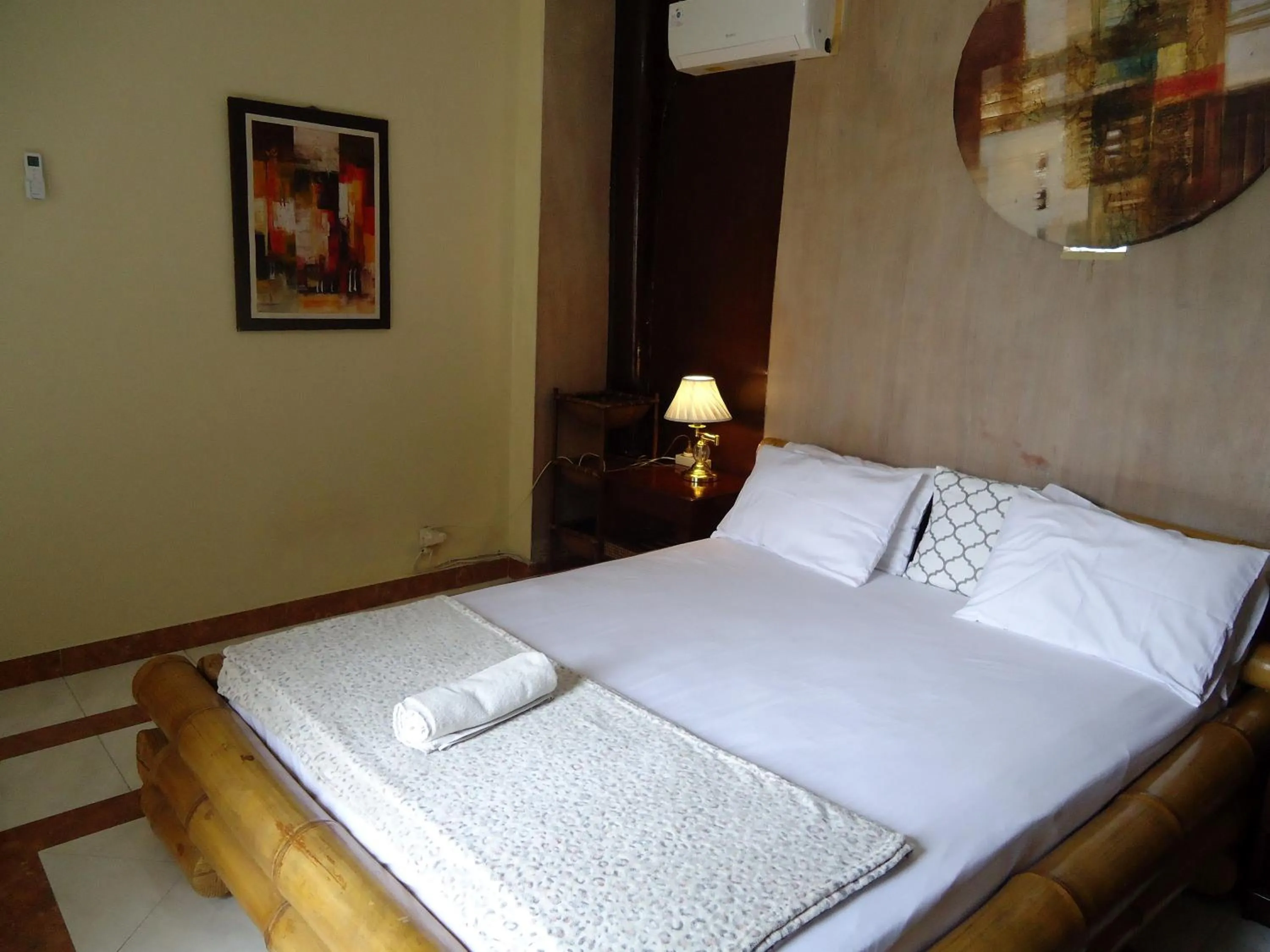Bed in The Reinhold Guesthouse Bali