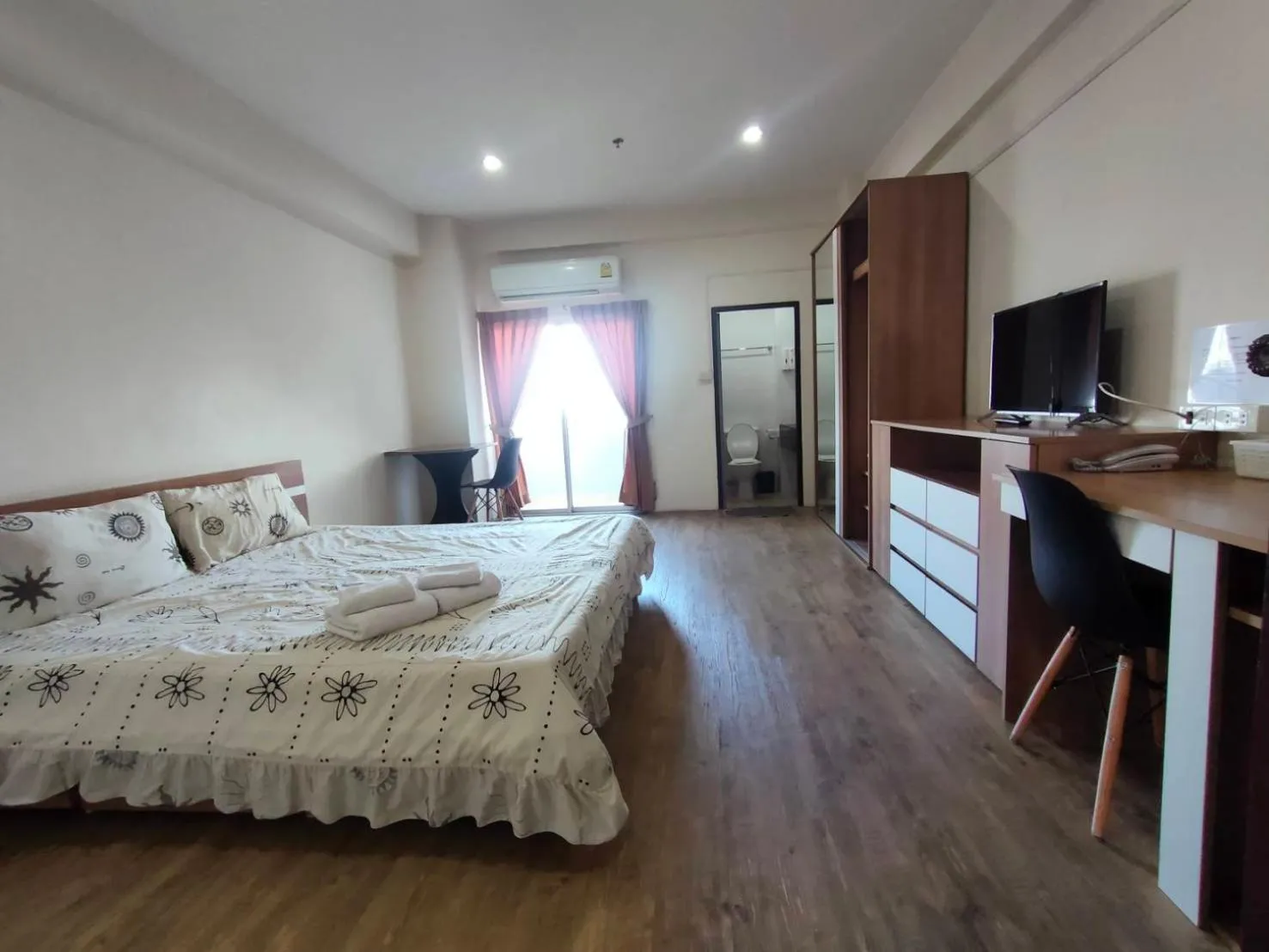 Bed in Komol Residence Bangkok