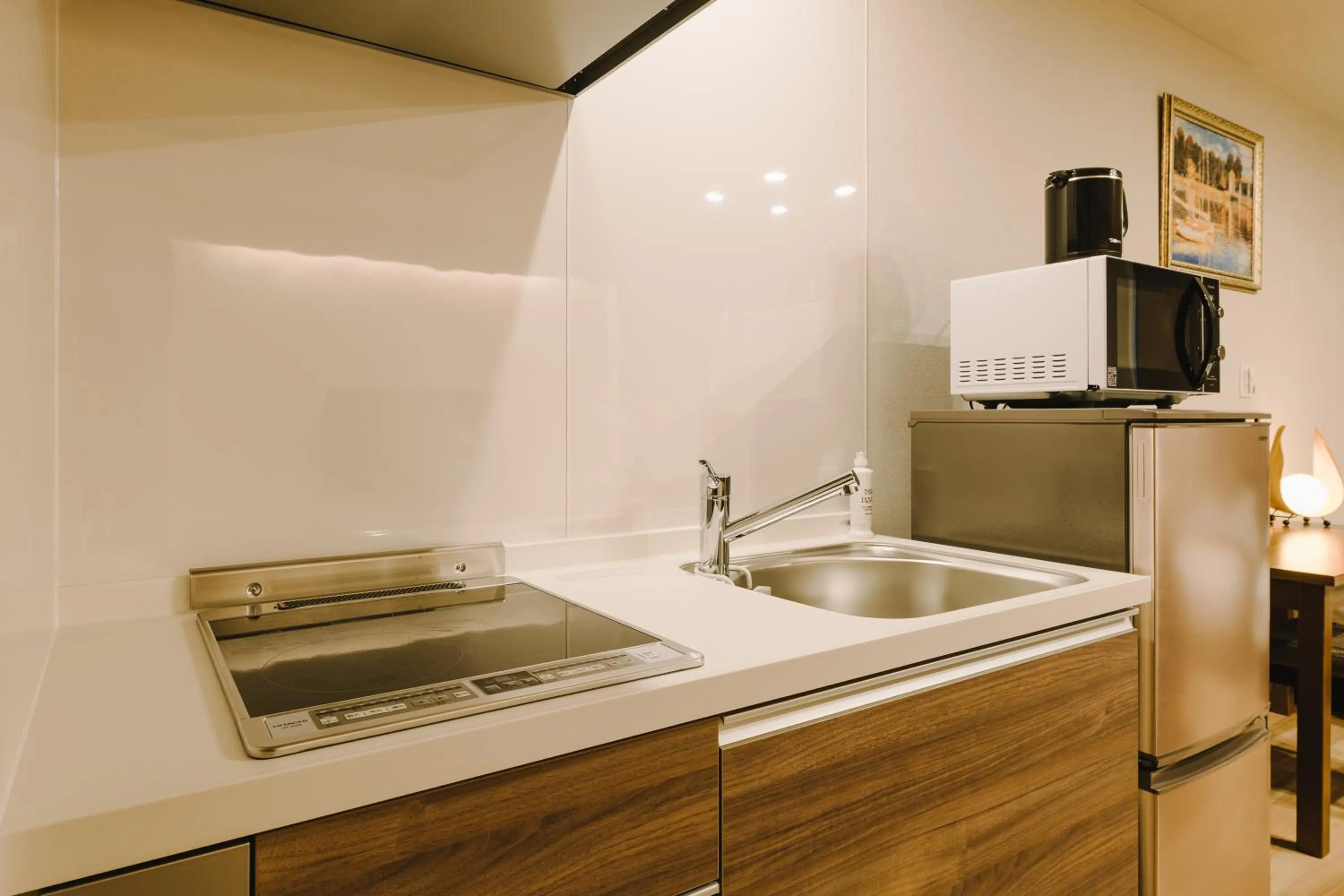 Kitchen or kitchenette in GRAND BASE Karatsu Ekiminami