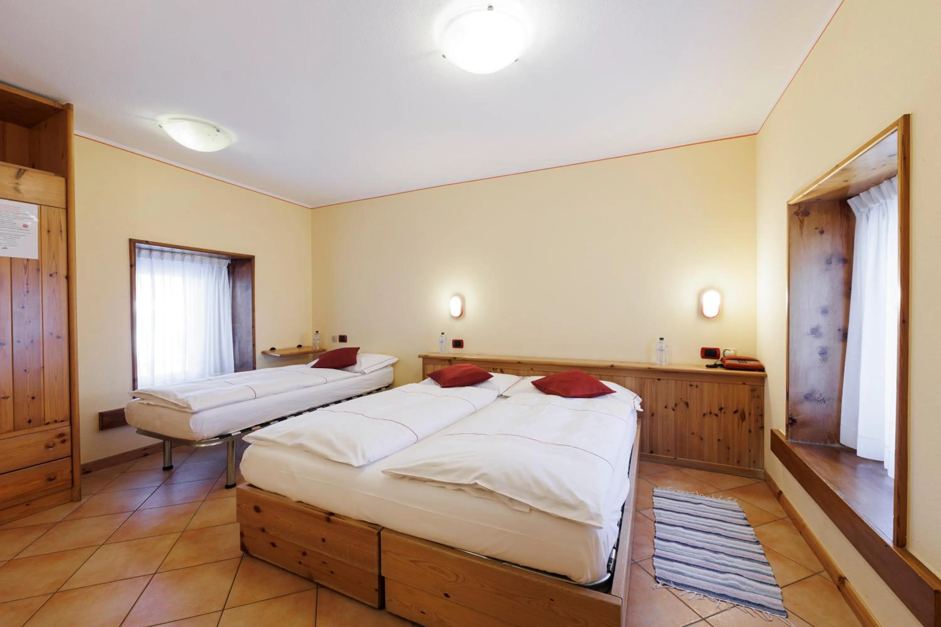 Bed in Hotel San Rocco