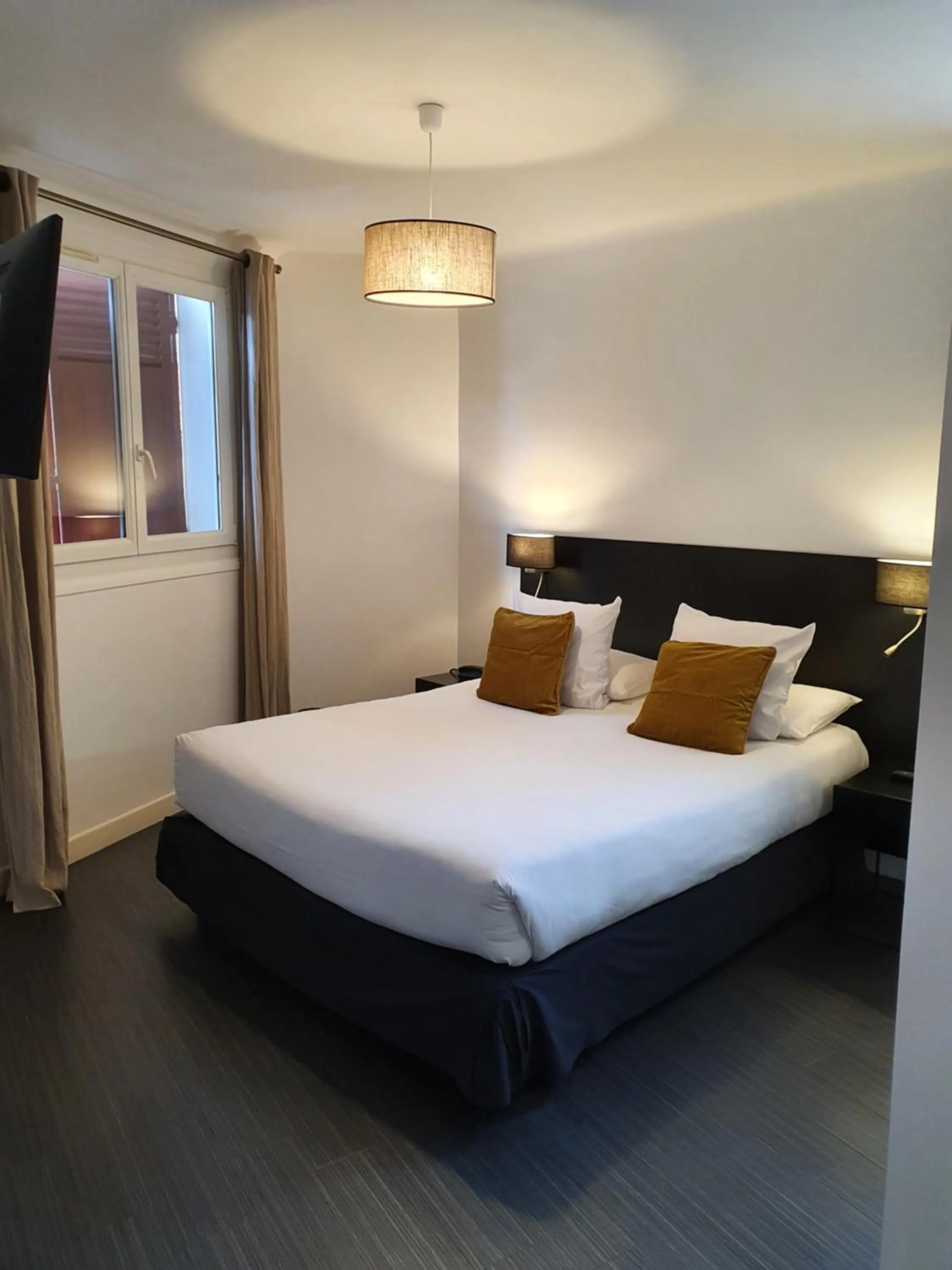 Bed in Hôtel Au Bon Coin