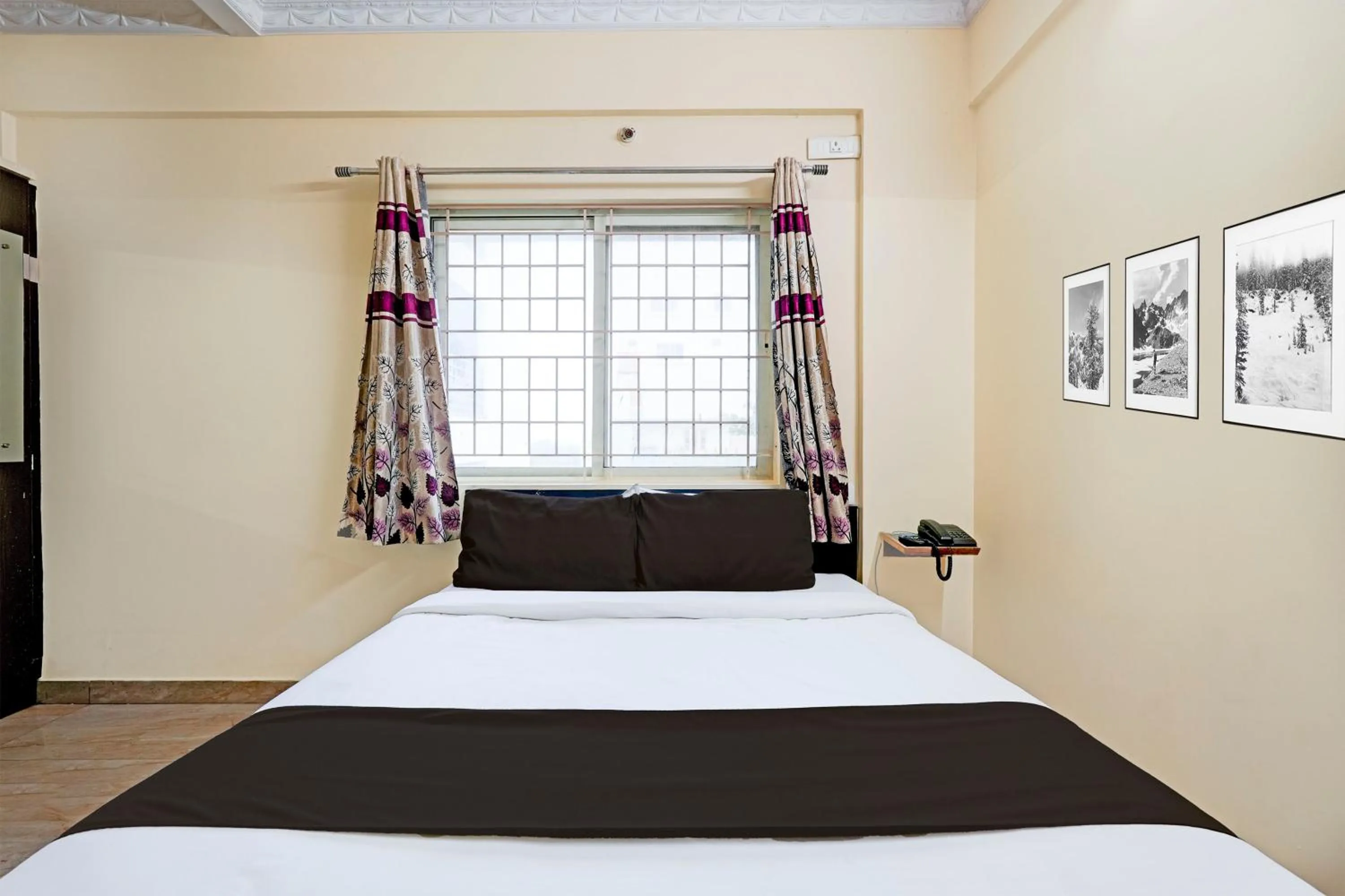 Bedroom in Hotel O Ganakkal Near BGS Hospital Junction formerly Omkar Inn.