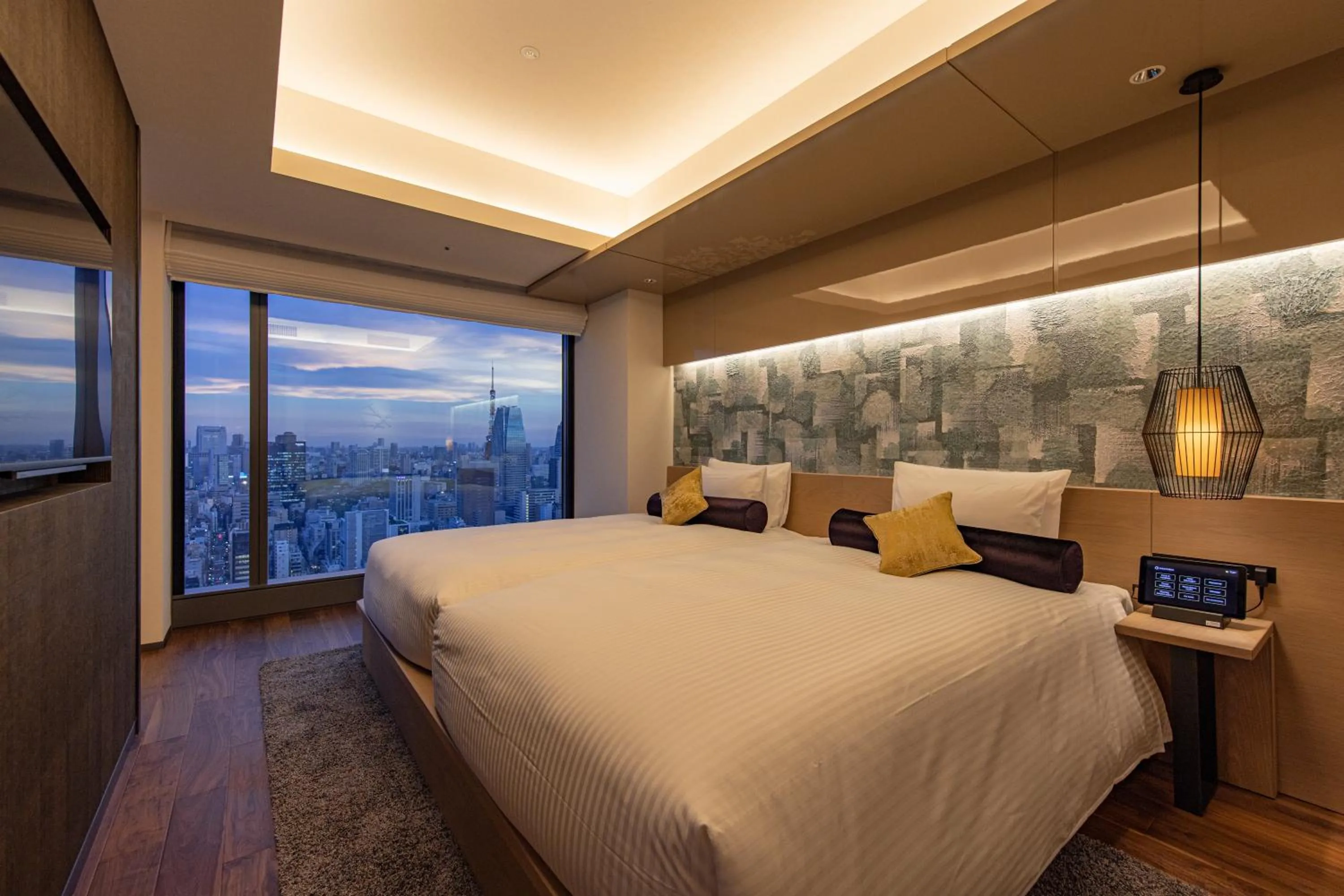 Bed in THE BLOSSOM HIBIYA