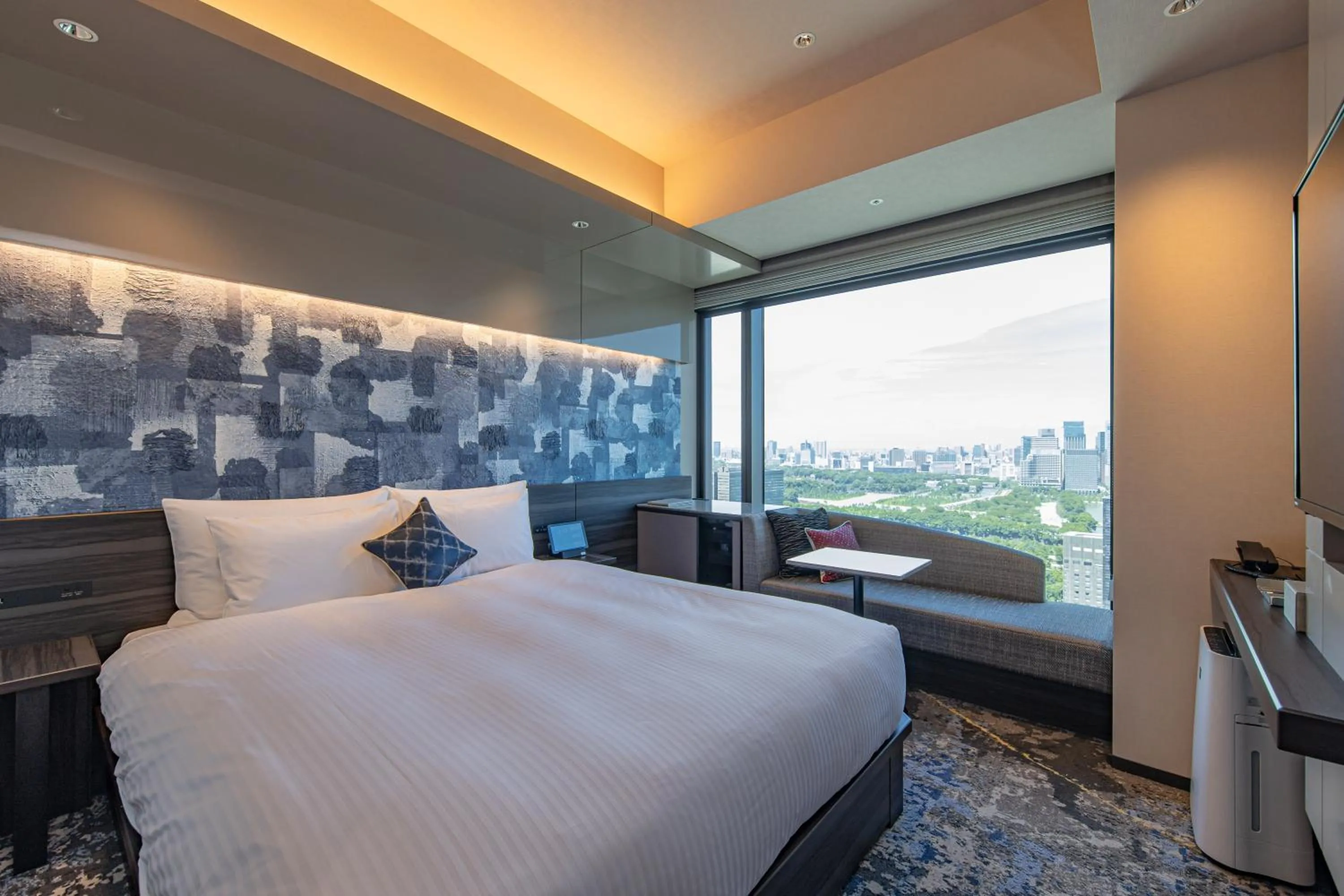 Bed in THE BLOSSOM HIBIYA