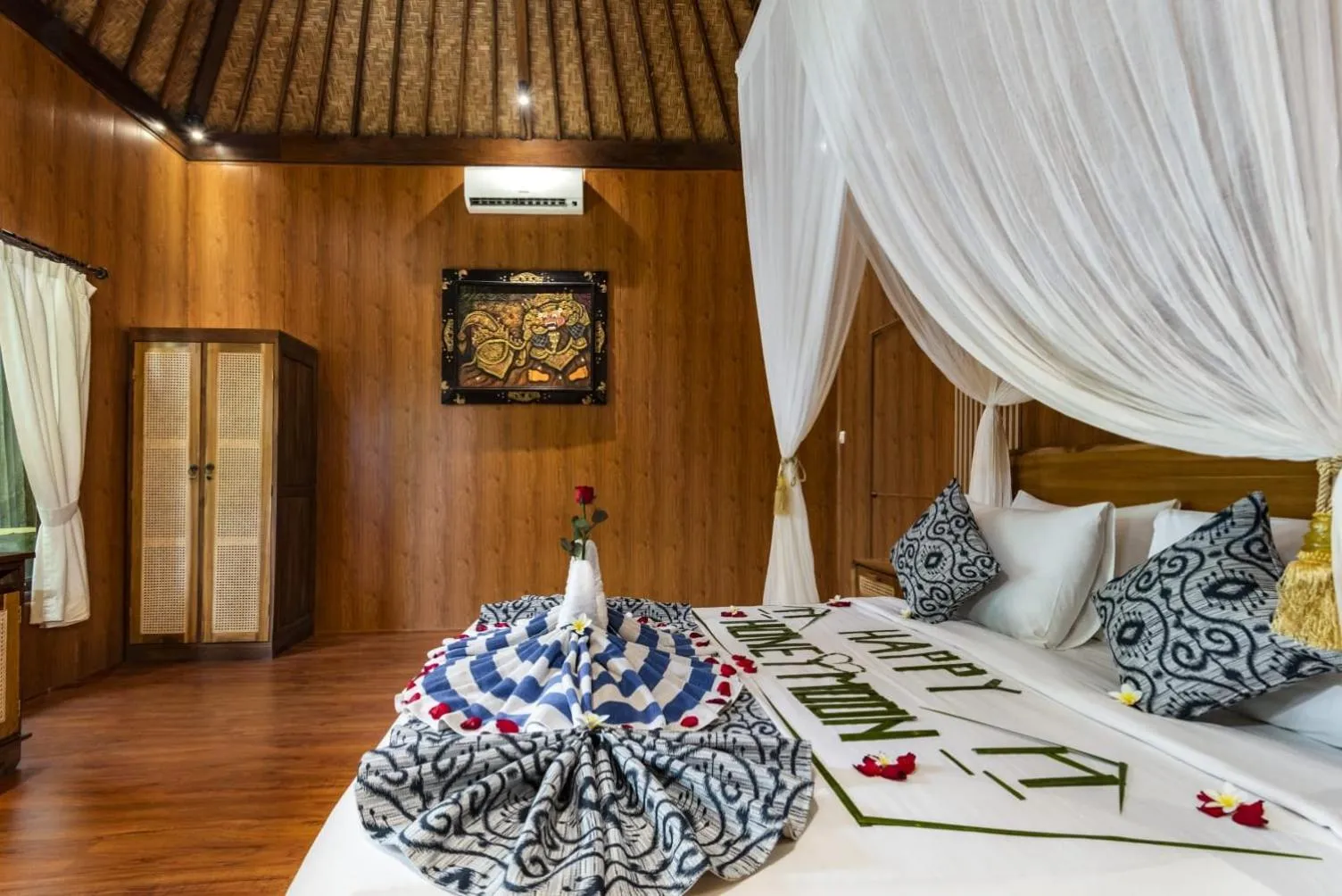 Bed in The Alus Cottage and Villa