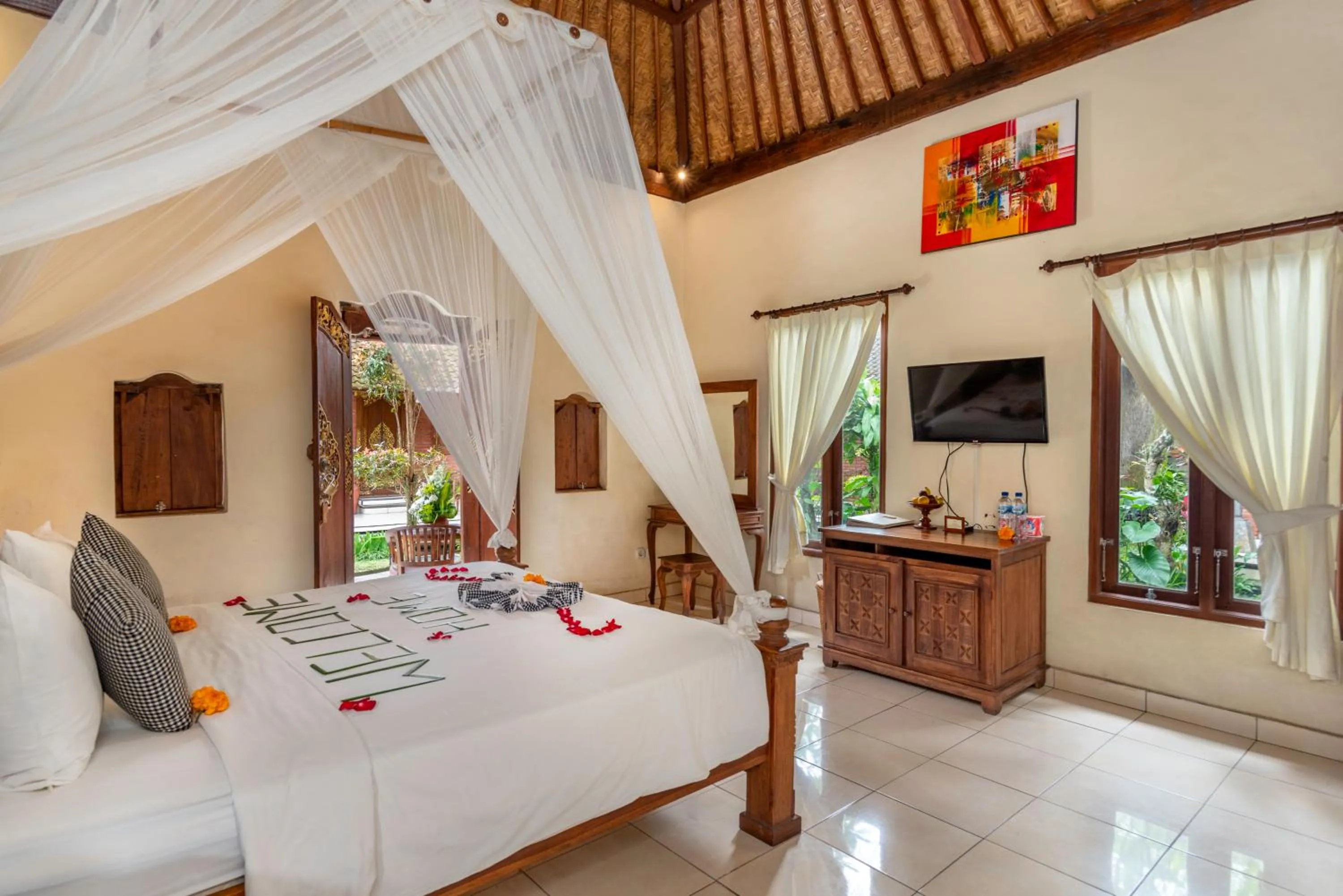 Bed in The Alus Cottage and Villa