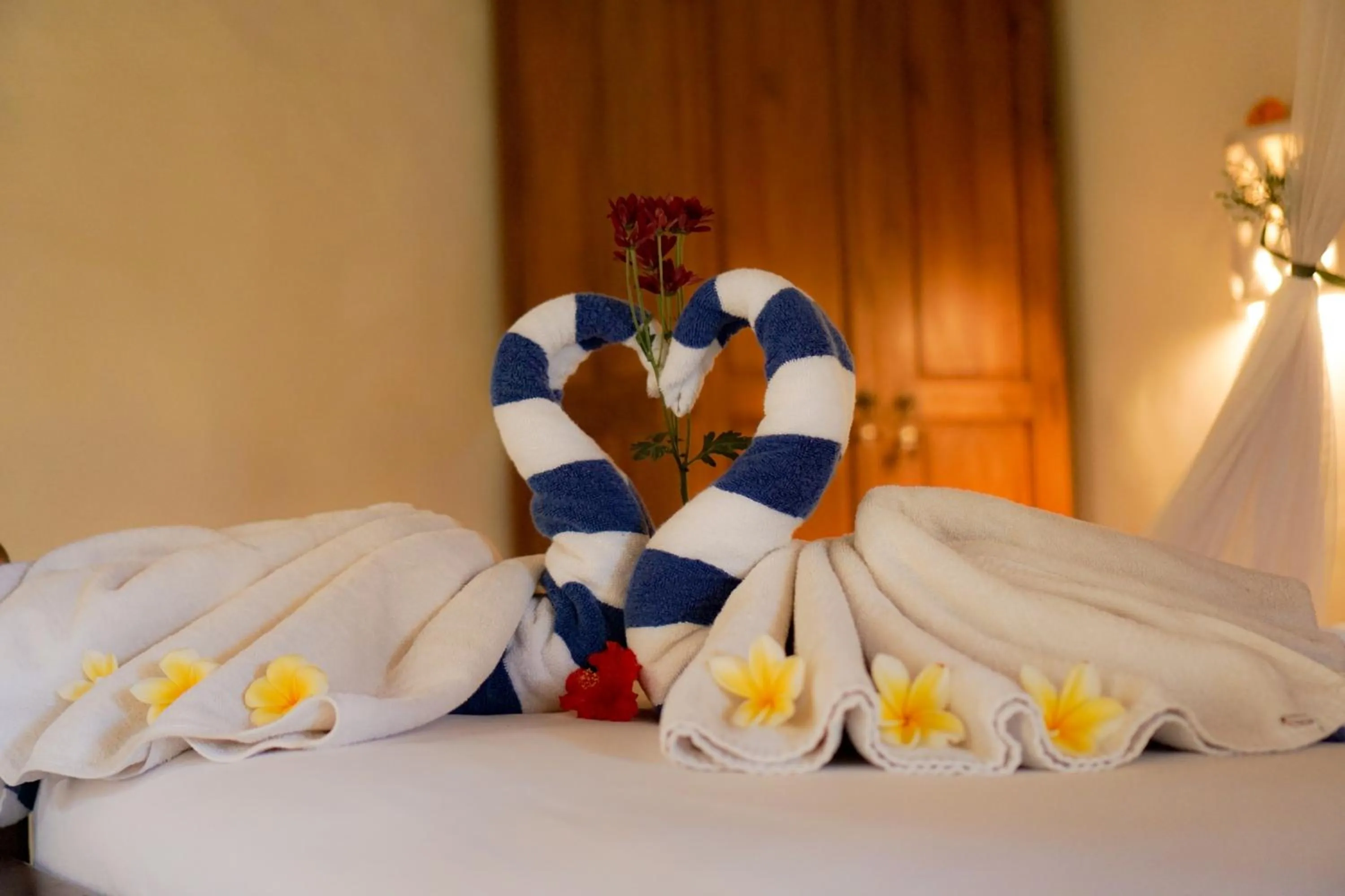 Bed in The Alus Cottage and Villa