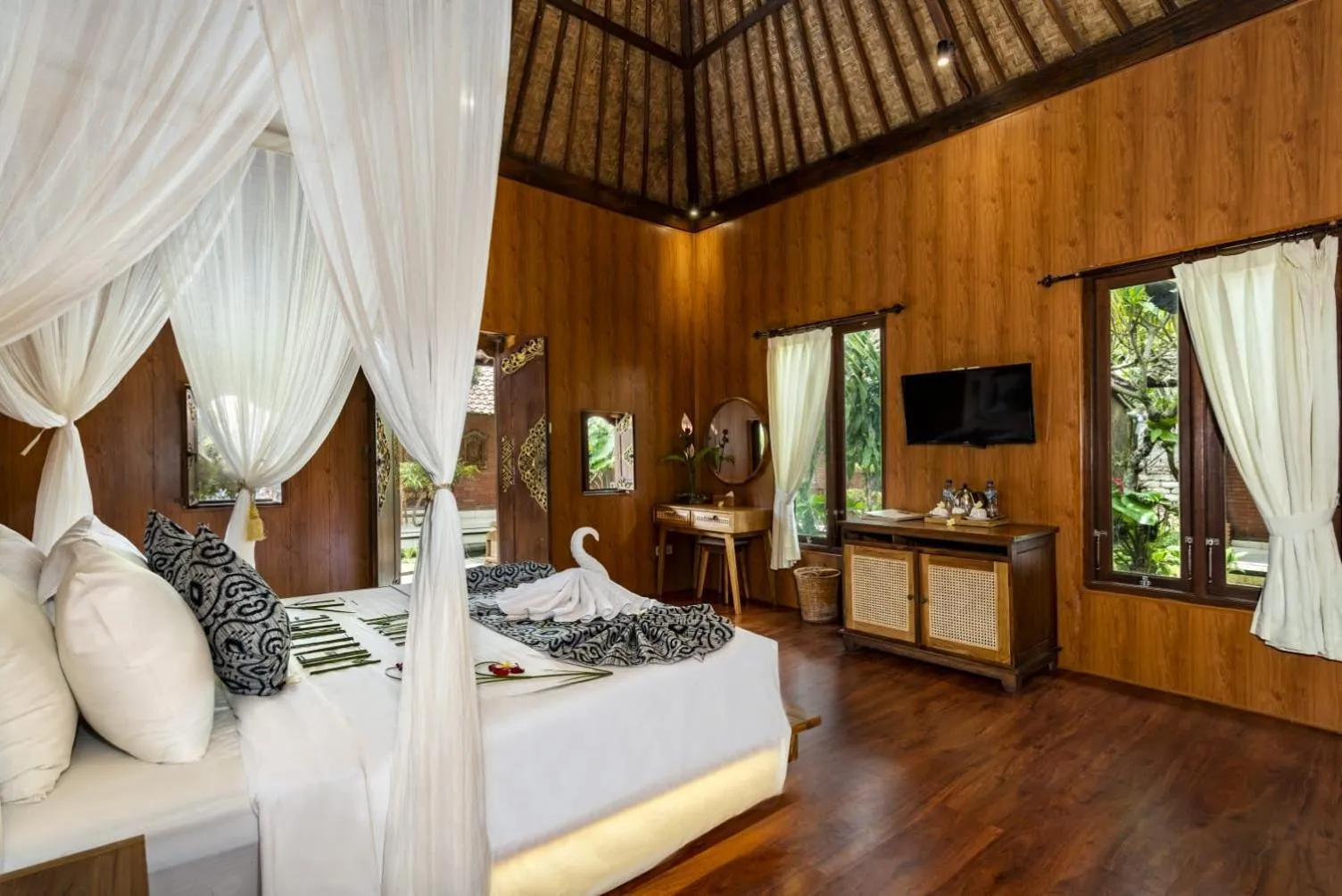 Bed in The Alus Cottage and Villa