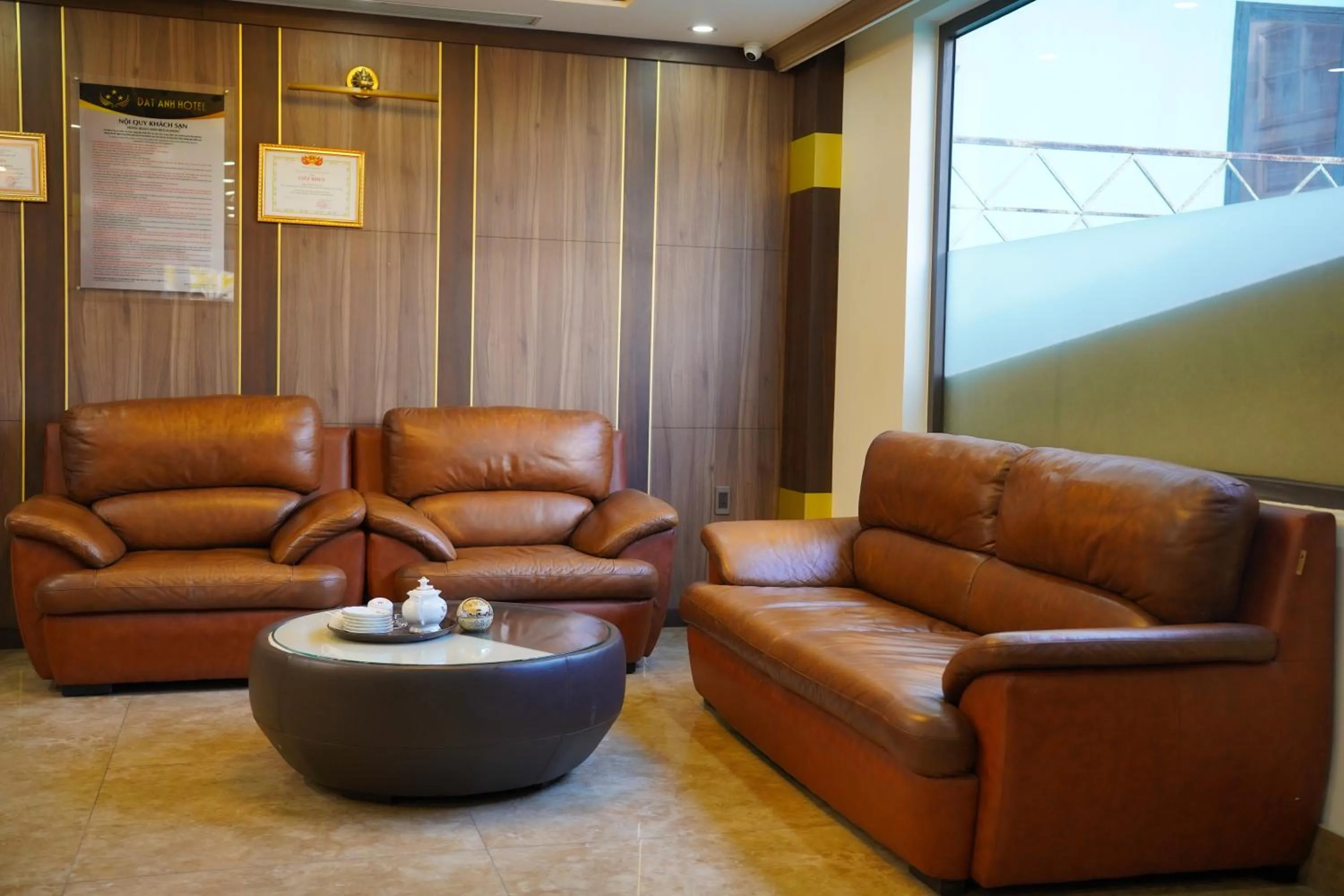 Communal lounge/ TV room in Dat Anh Hotel