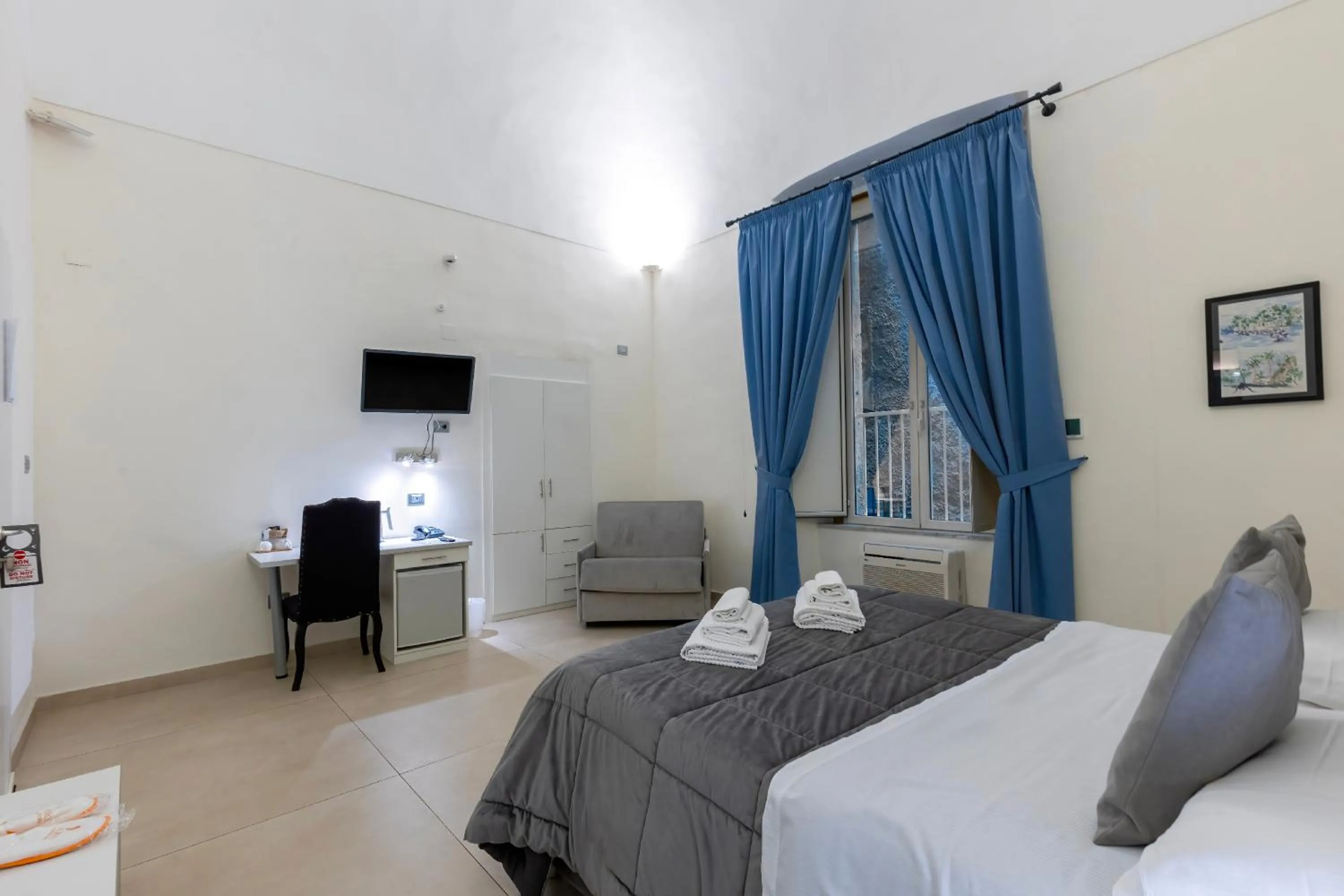 Bed in Il Tesoro Smart Suite & SPA