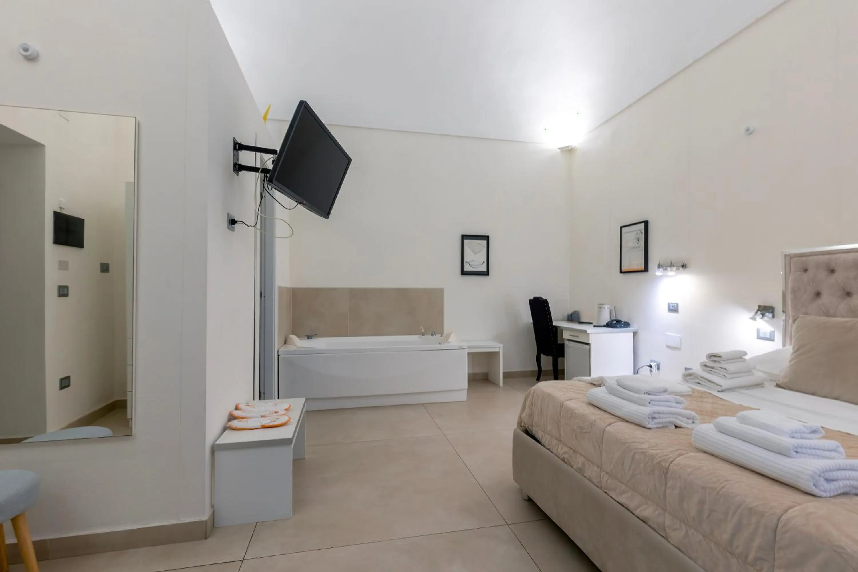 Bed in Il Tesoro Smart Suite & SPA