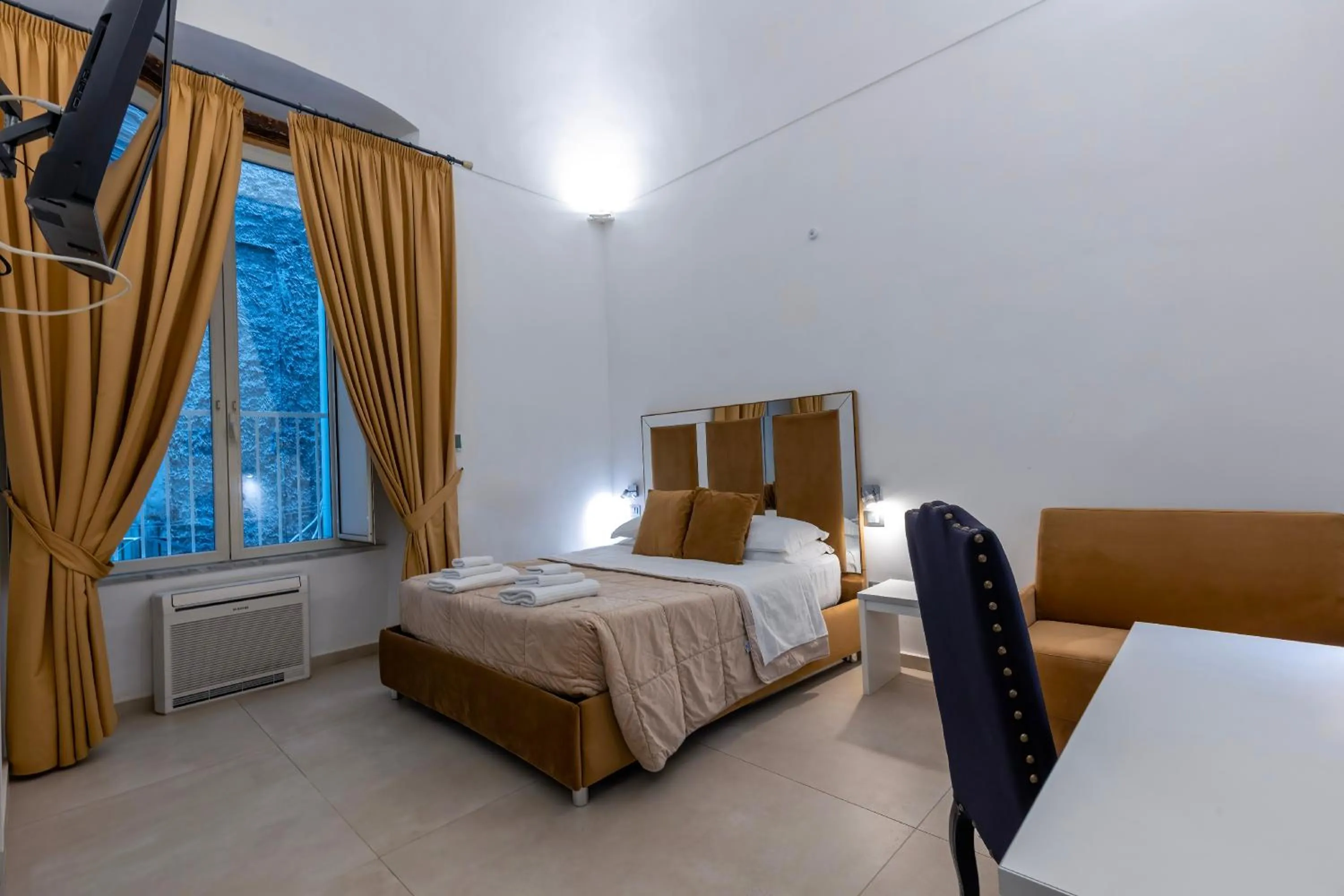 Bed in Il Tesoro Smart Suite & SPA