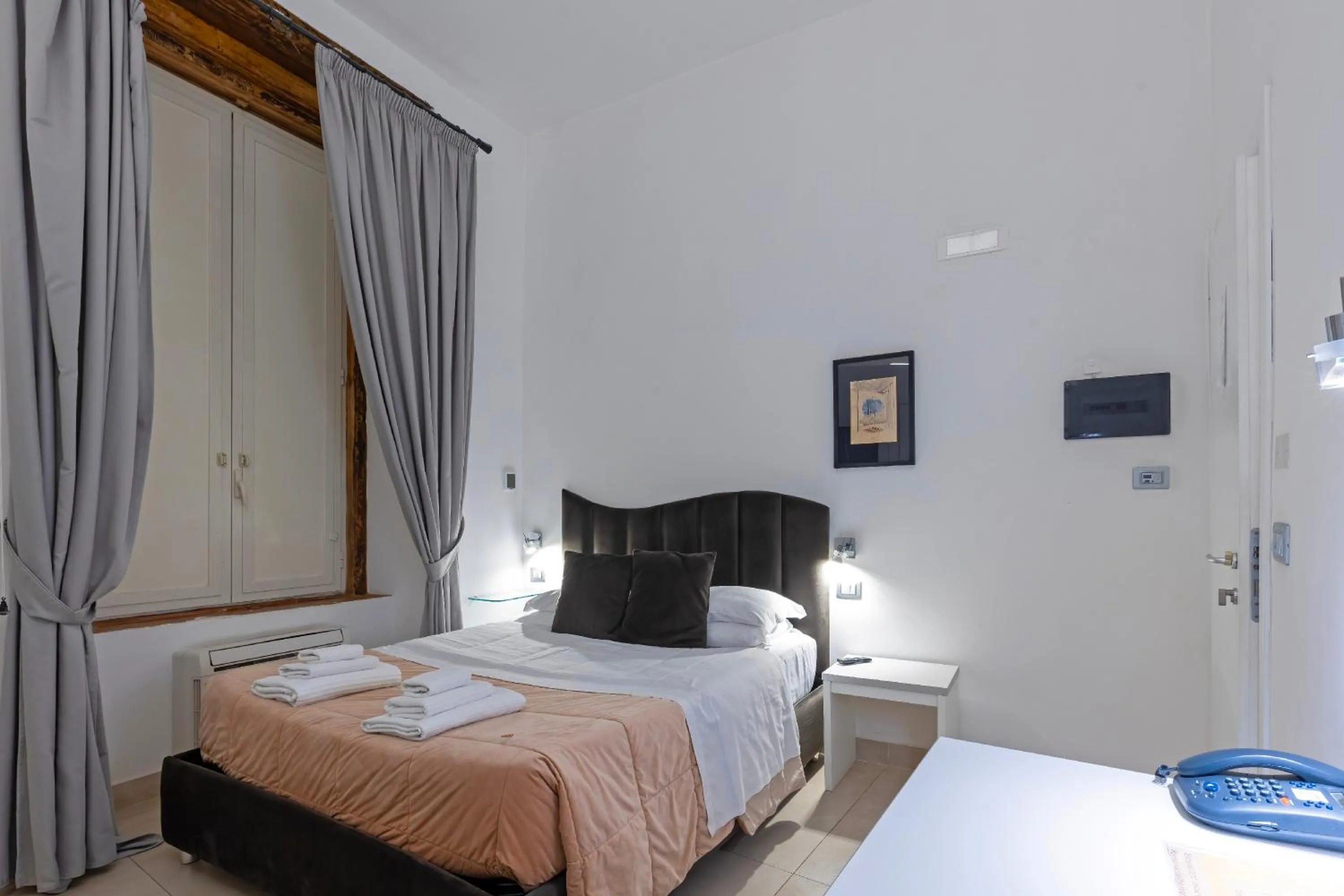 Bed in Il Tesoro Smart Suite & SPA