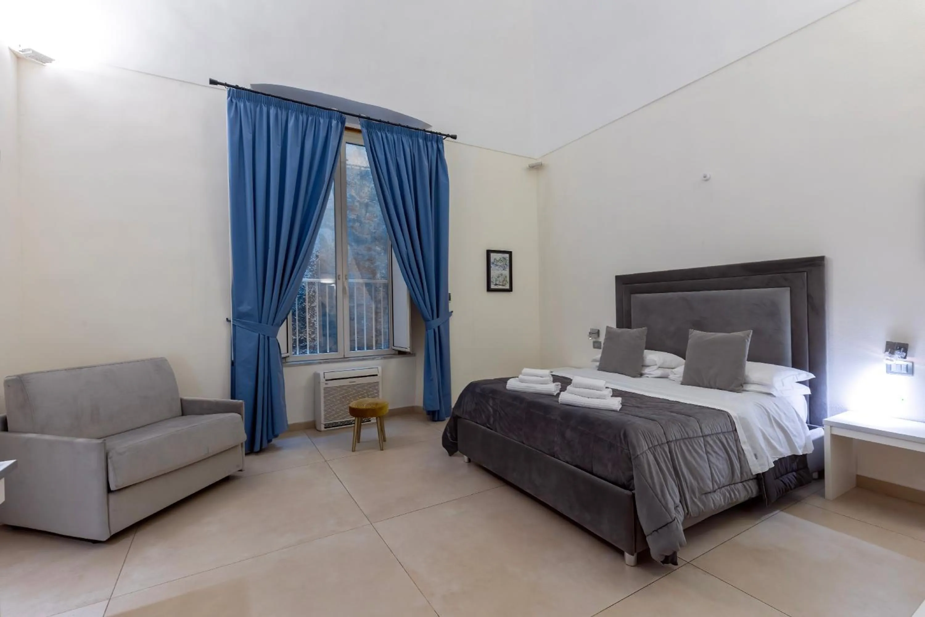 Bed in Il Tesoro Smart Suite & SPA